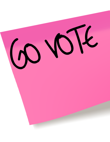 Pink sign with black handwritten text reading 'Go Vote'.