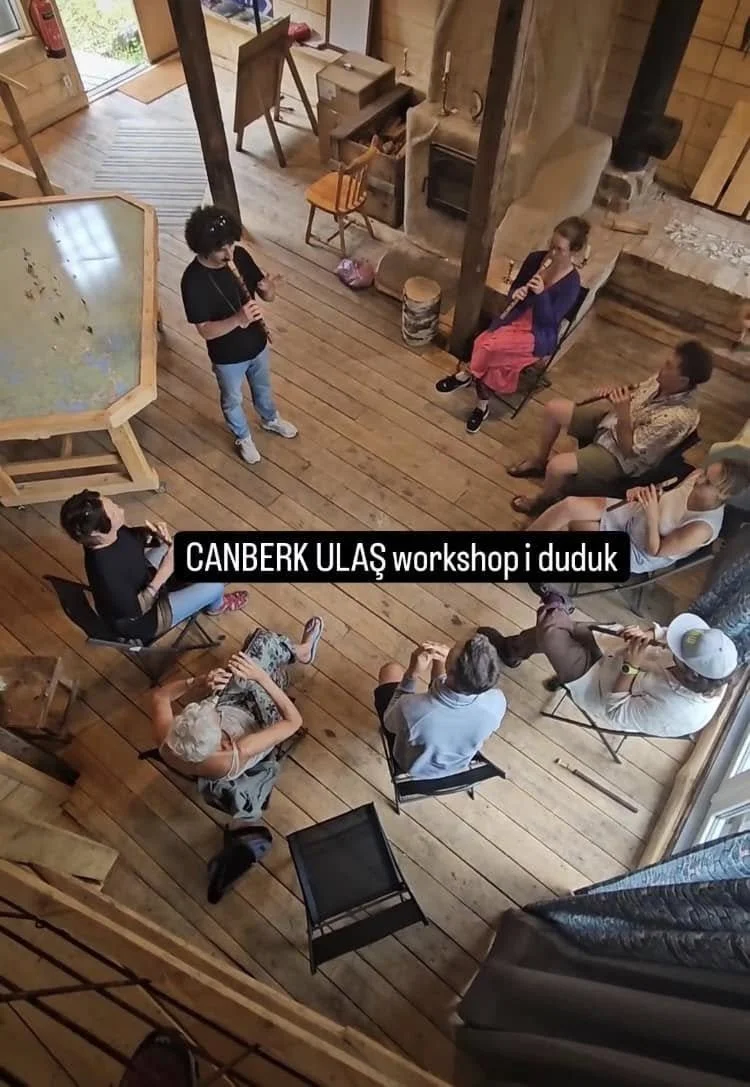Duduk workshop. Canberk teaches duduk to a group of people