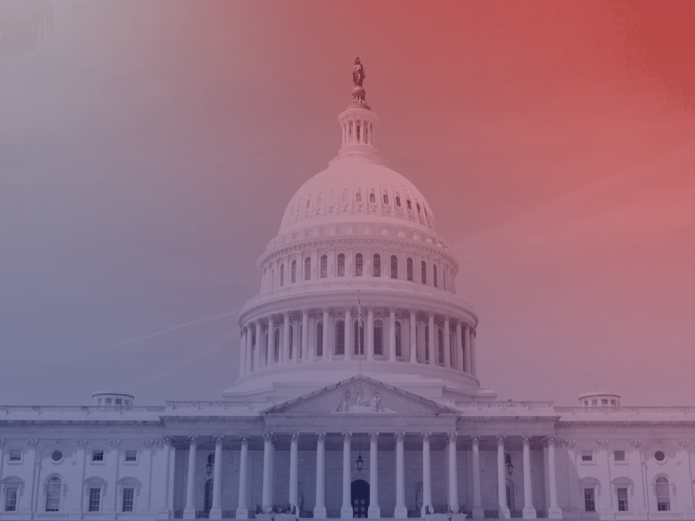 The United States Capitol building in Washington, D.C., with a gradient pink and gray sky in the background.