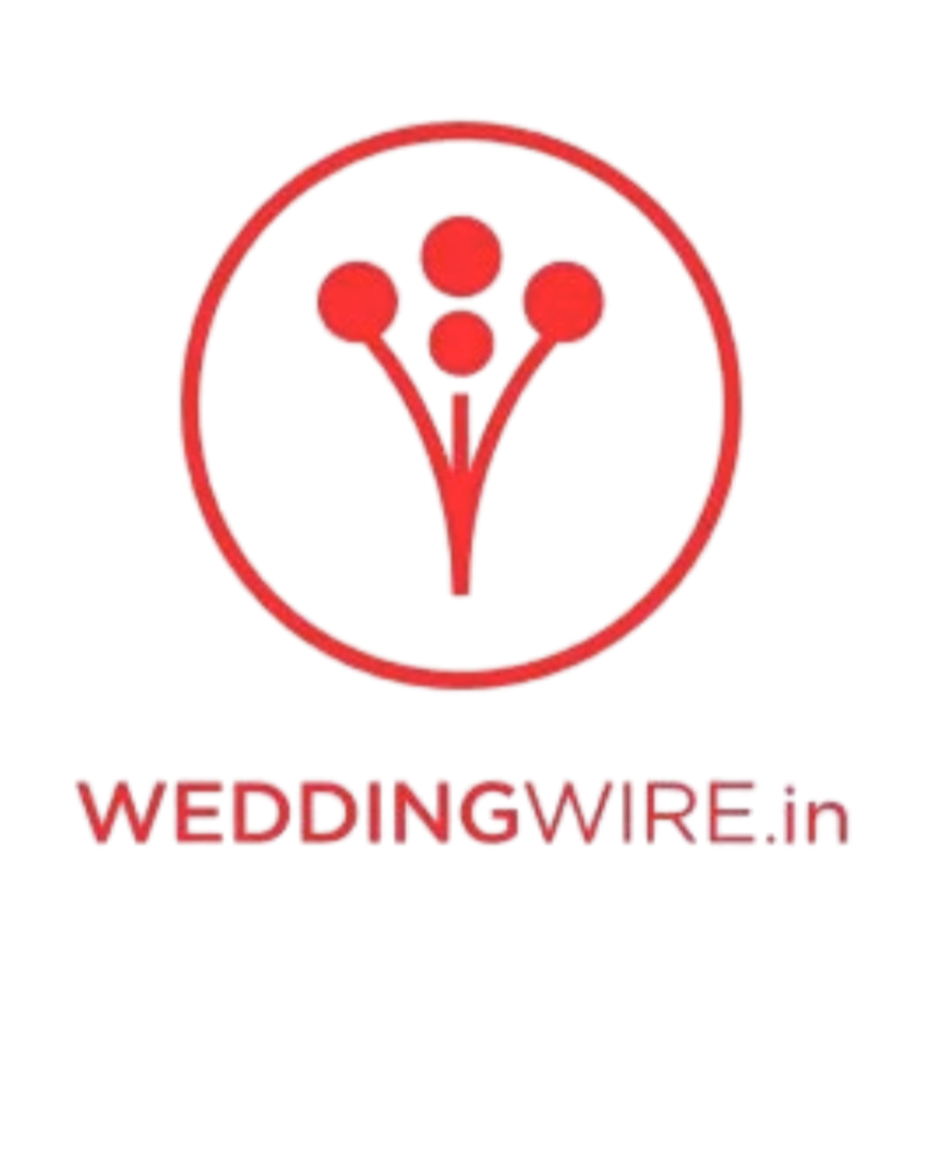 Red logo with a stylized flower and the text "WEDDINGWIRE.in" underneath. Wedding Wire India and Canada
