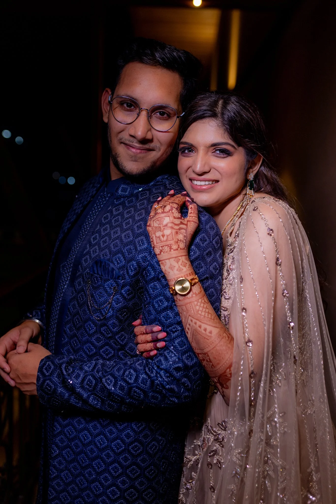 Regal Indian wedding ceremony with a couple at a historic palace venue.