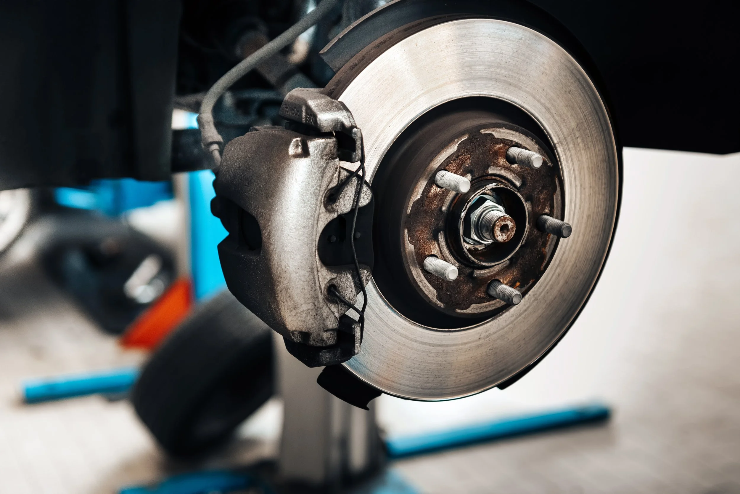 Close-up of newly installed brake components showing clean rotors and brake hardware at Black Bear Auto Service in Burnaby, BC