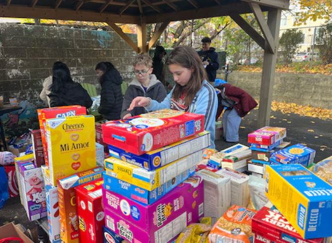 School spirit meets community service as Staten Island students pack meals at food pantry