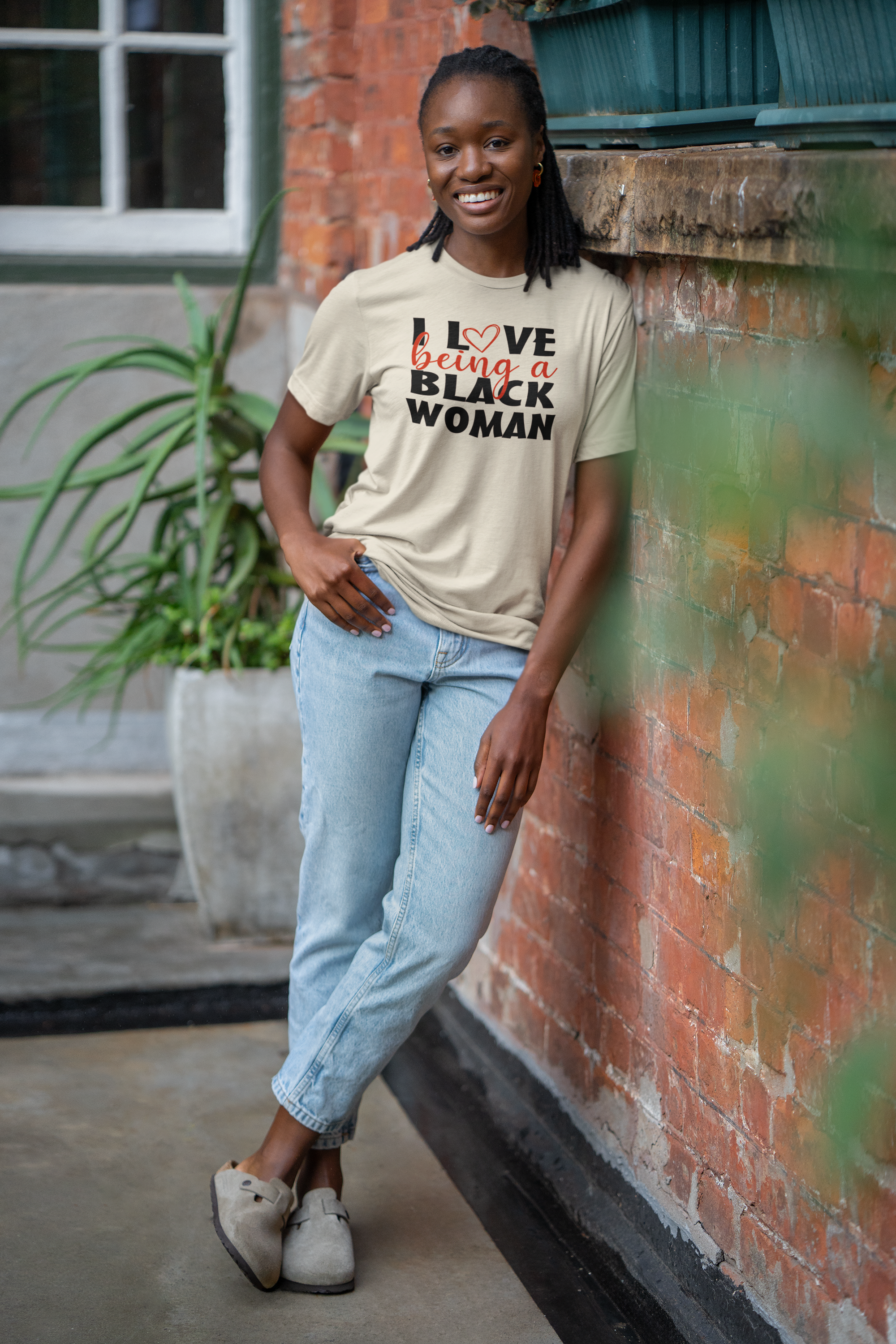 bella-canvas-mockup-of-cheerful-woman-wearing-a-round-neck-t-shirt-and-posing-on-brick-wall-m39786 (1).png