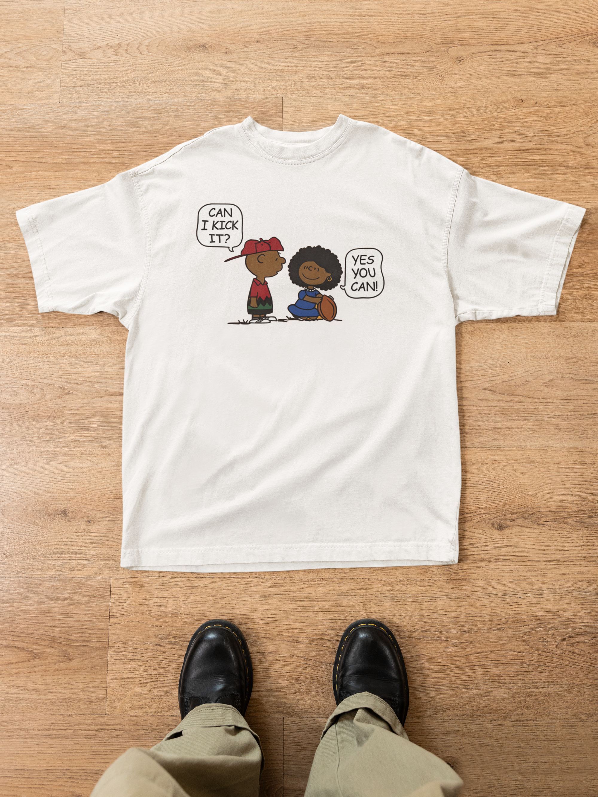 oversized-t-shirt-mockup-featuring-a-man-s-legs-and-a-wooden-floor-m52018.png