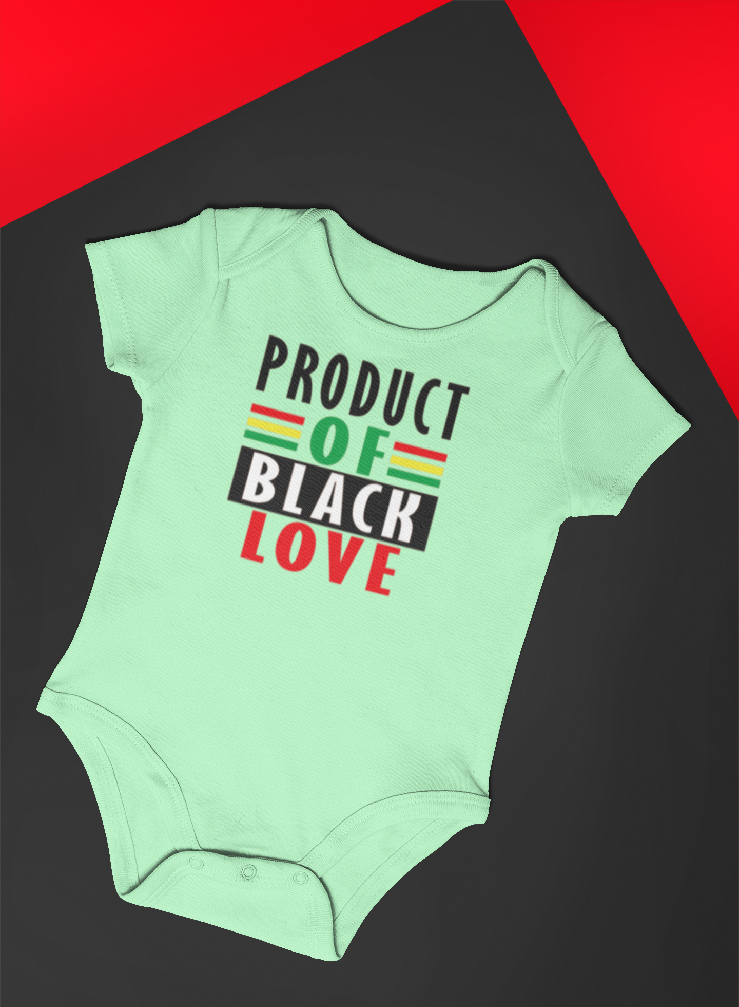 mockup-of-a-baby-onesie-lying-in-a-colored-setting-25177.png