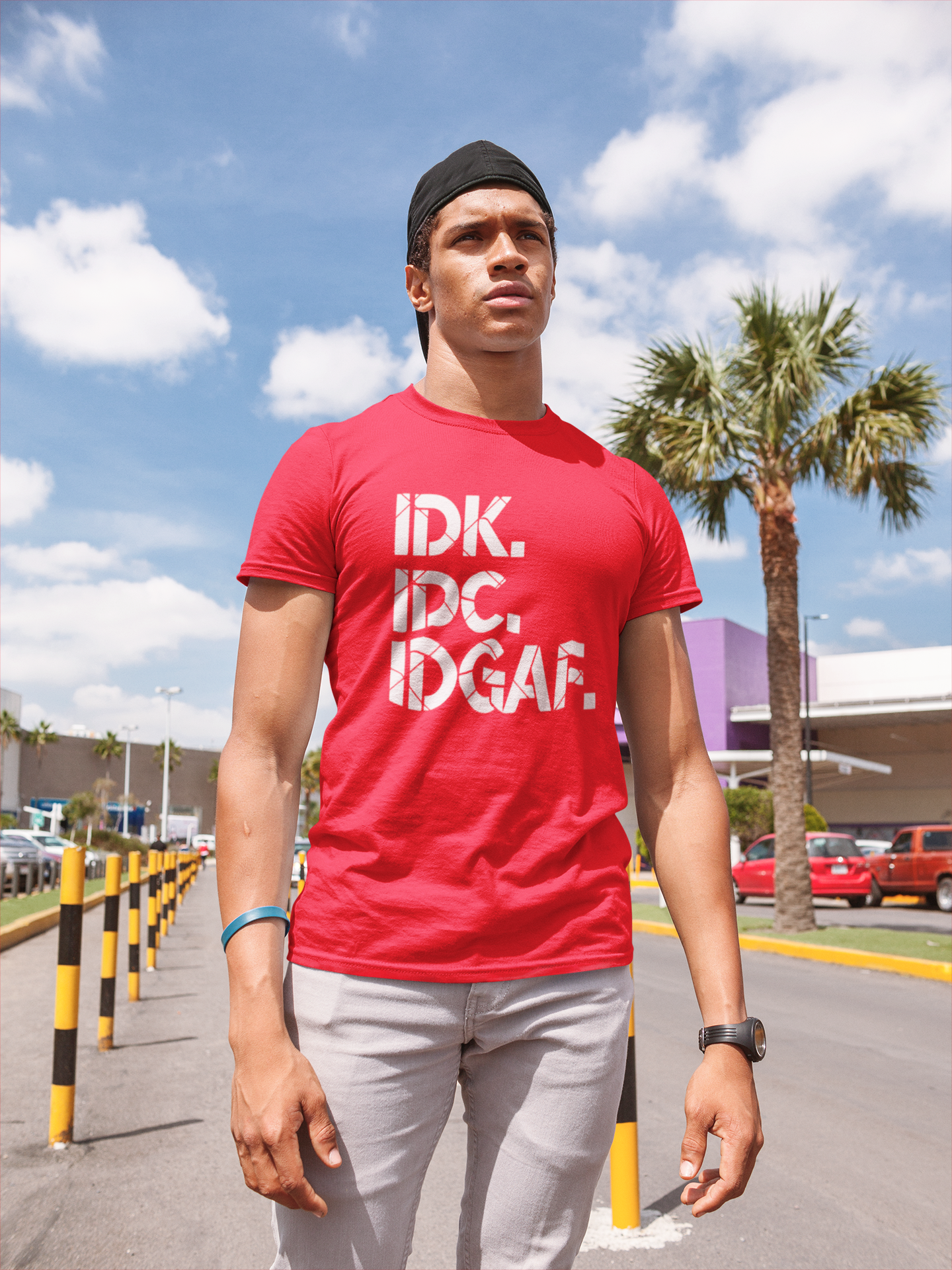 mockup-of-a-young-man-wearing-a-tshirt-by-a-palm-tree-at-a-parking-lot-22412 (1).png