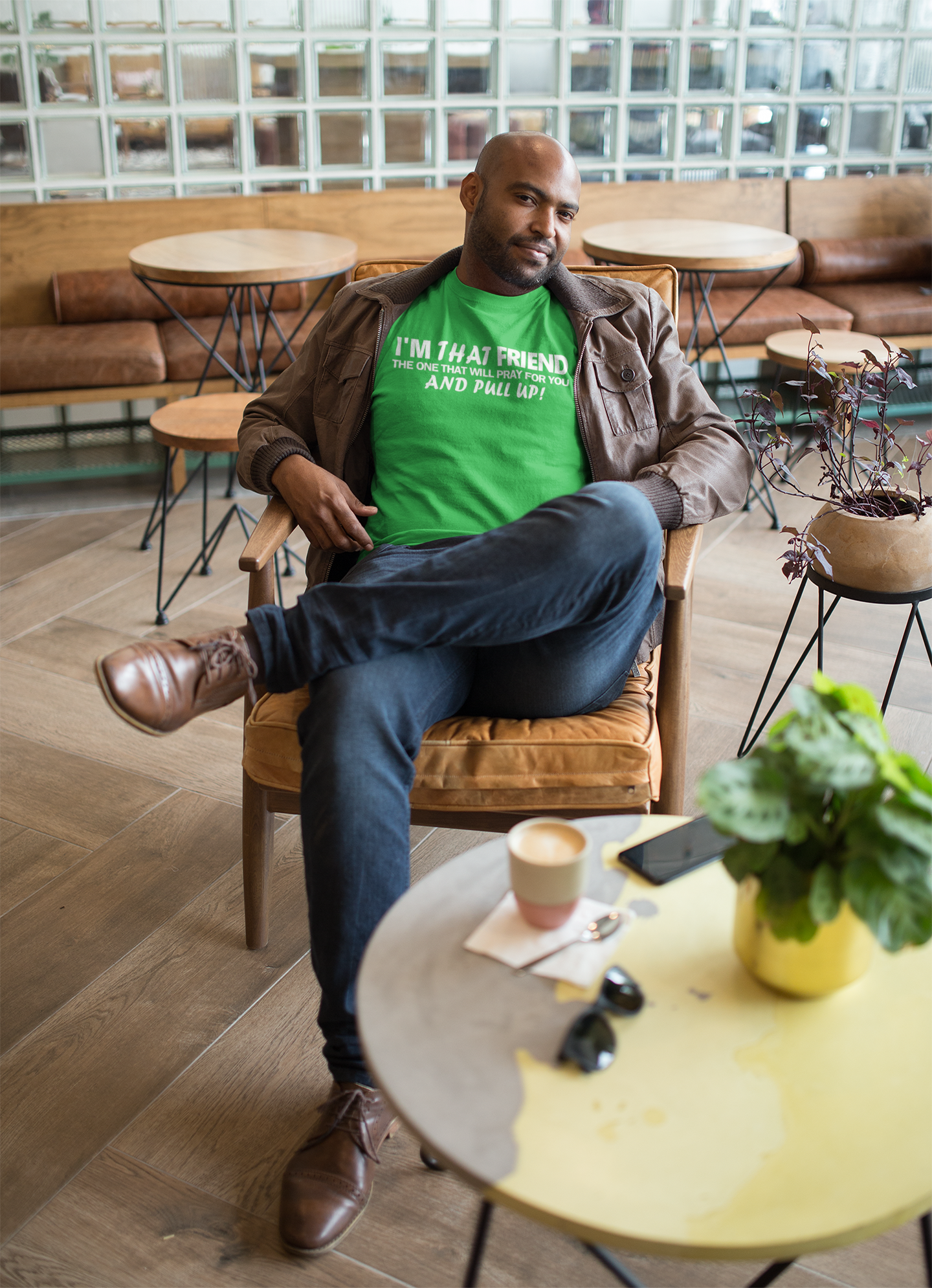 t-shirt-mockup-featuring-a-man-in-a-cool-cafe-21698 (1).png