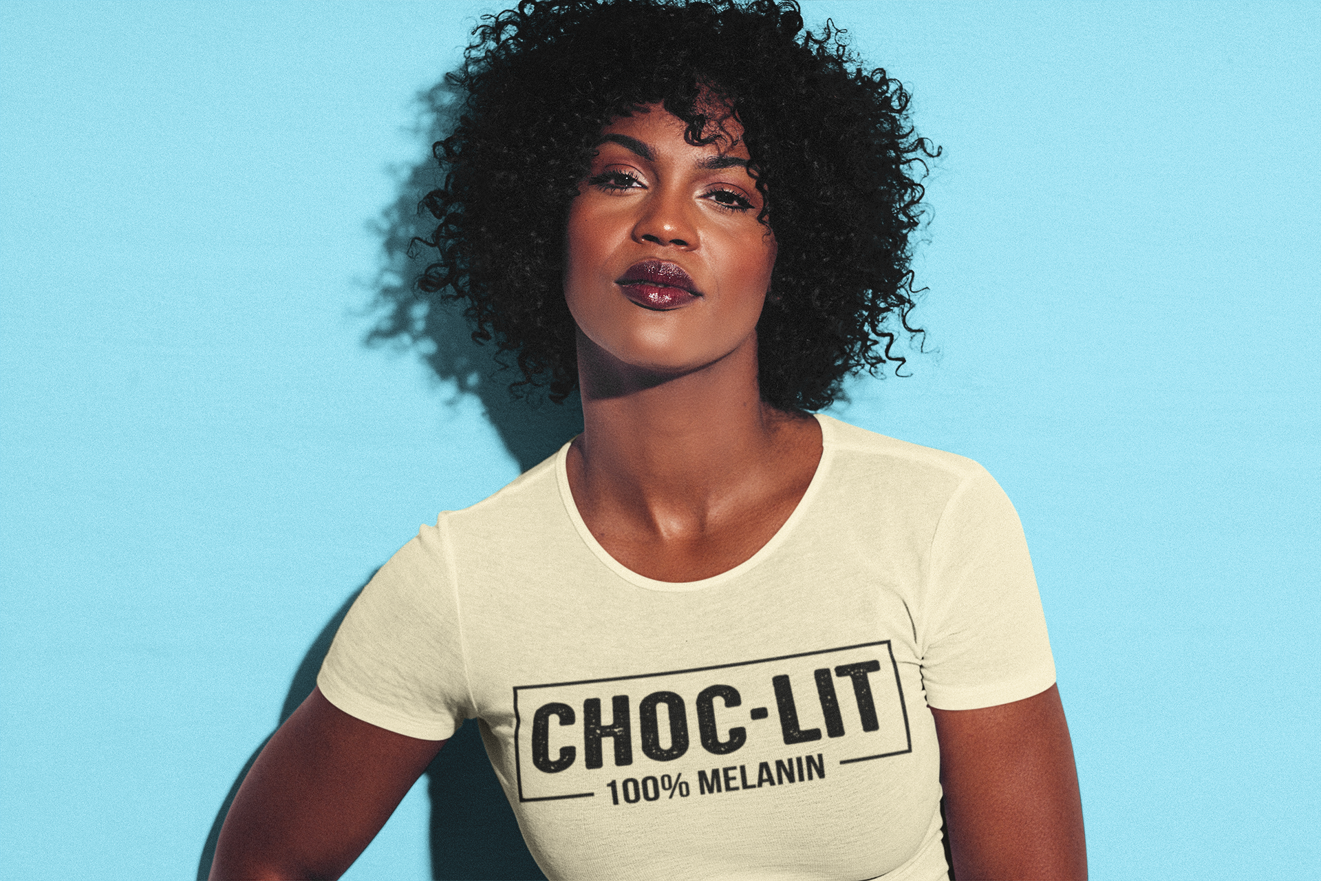t-shirt-mockup-of-a-curly-haired-woman-with-a-strong-look-on-her-face-38804-r-el2.png