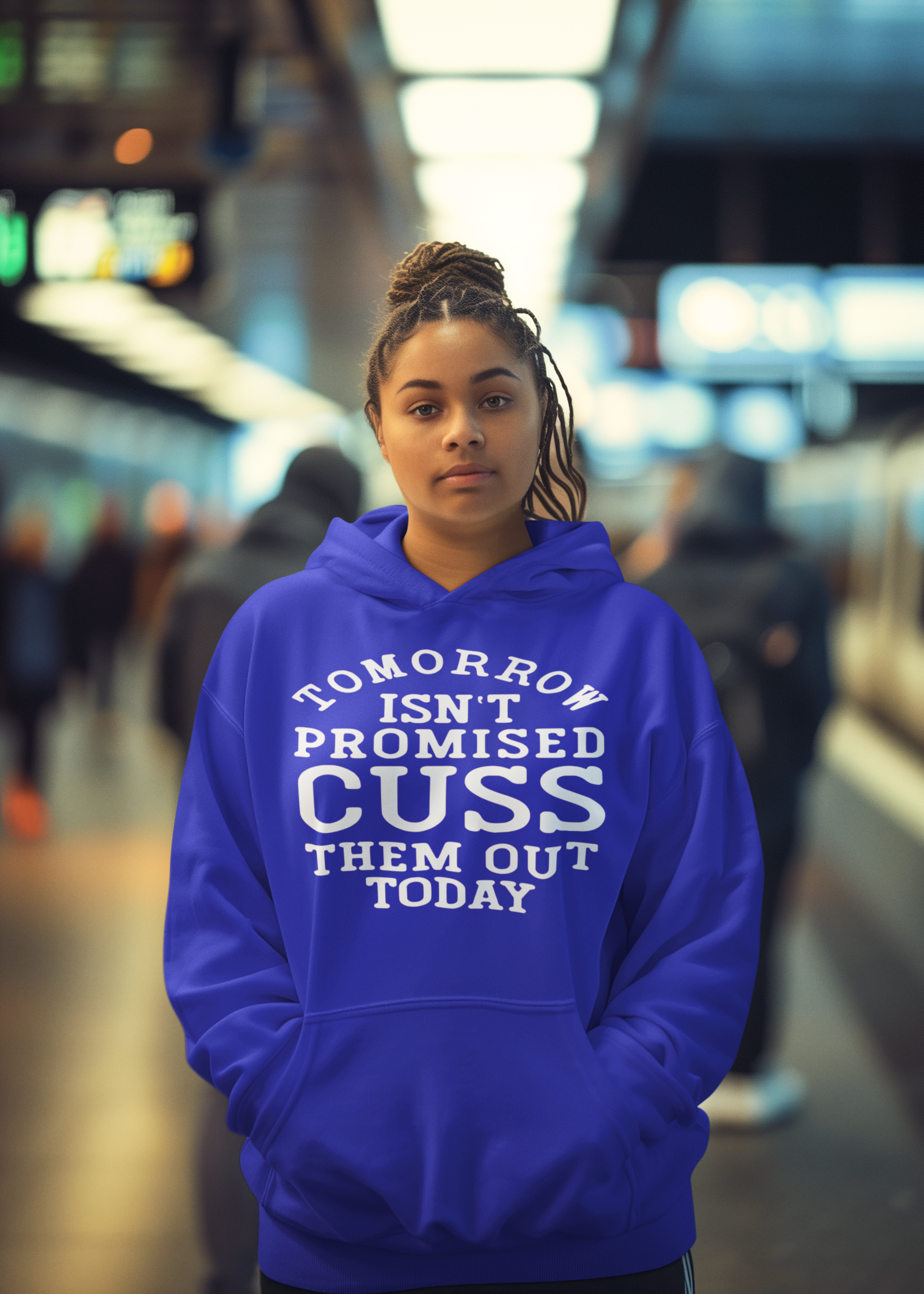 mockup-of-an-ai-created-woman-wearing-a-pullover-hoodie-in-a-subway-station-m38441 (1).png