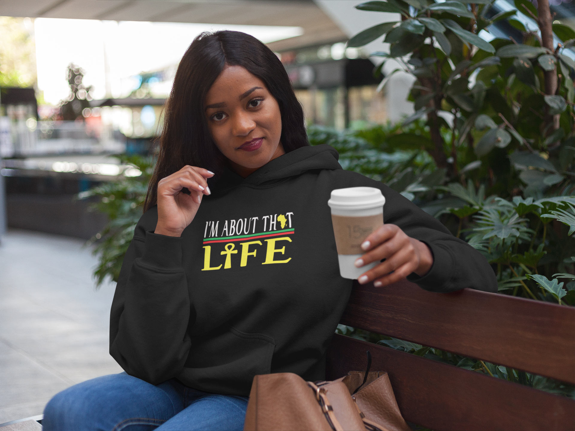 mockup-of-a-woman-having-a-coffee-while-wearing-a-pullover-hoodie-17746.png