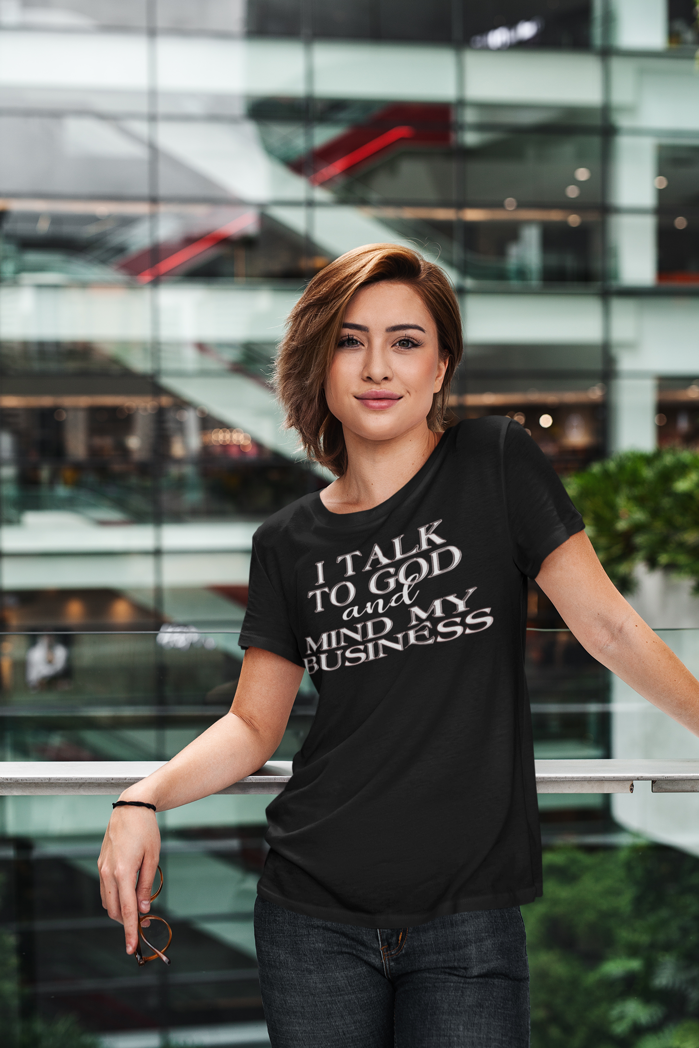 t-shirt-mockup-of-a-cool-woman-in-a-modern-building-414-el.png