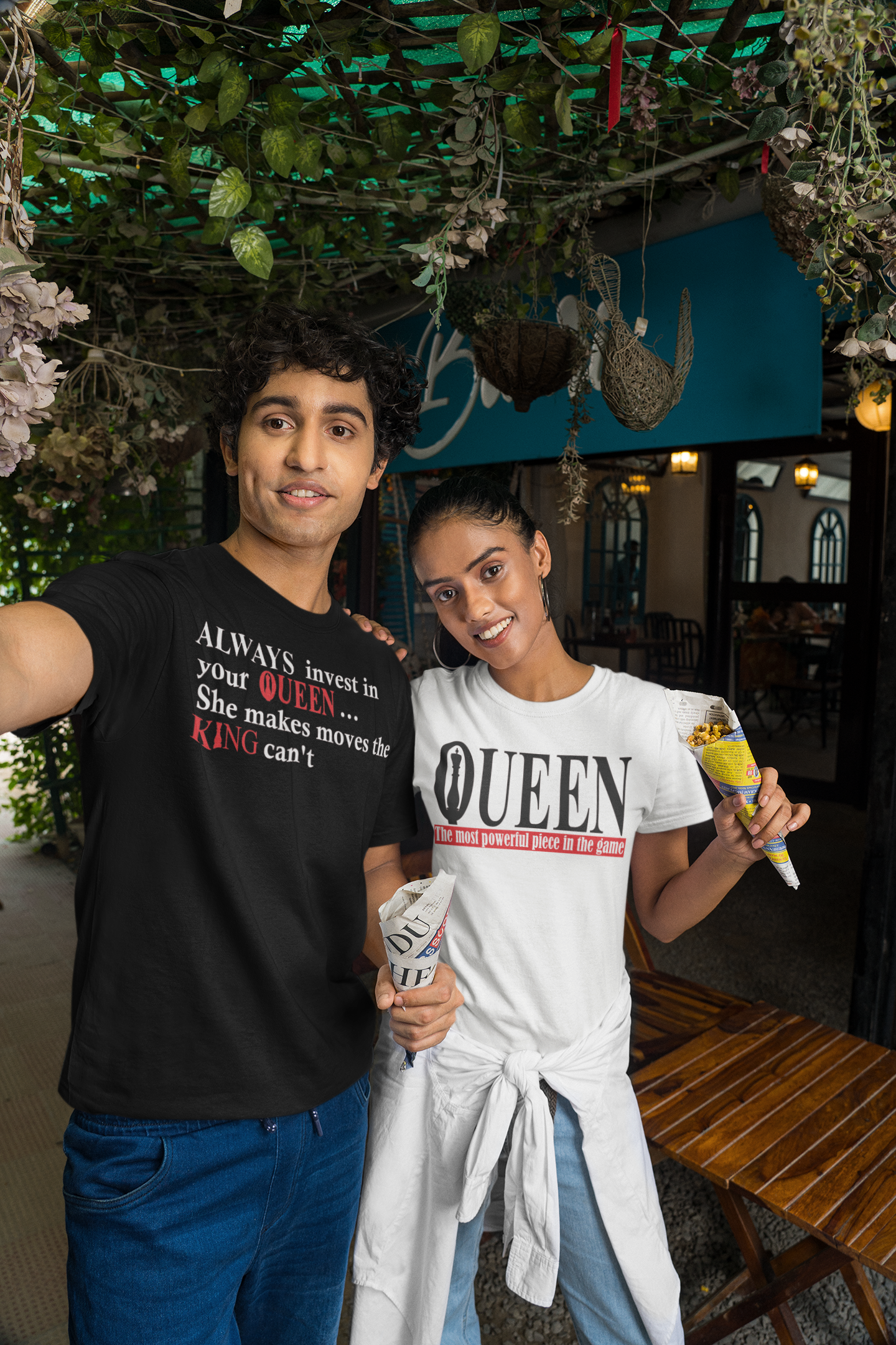 gildan-t-shirt-mockup-featuring-a-couple-taking-a-selfie-while-eating-street-food-m30303.png