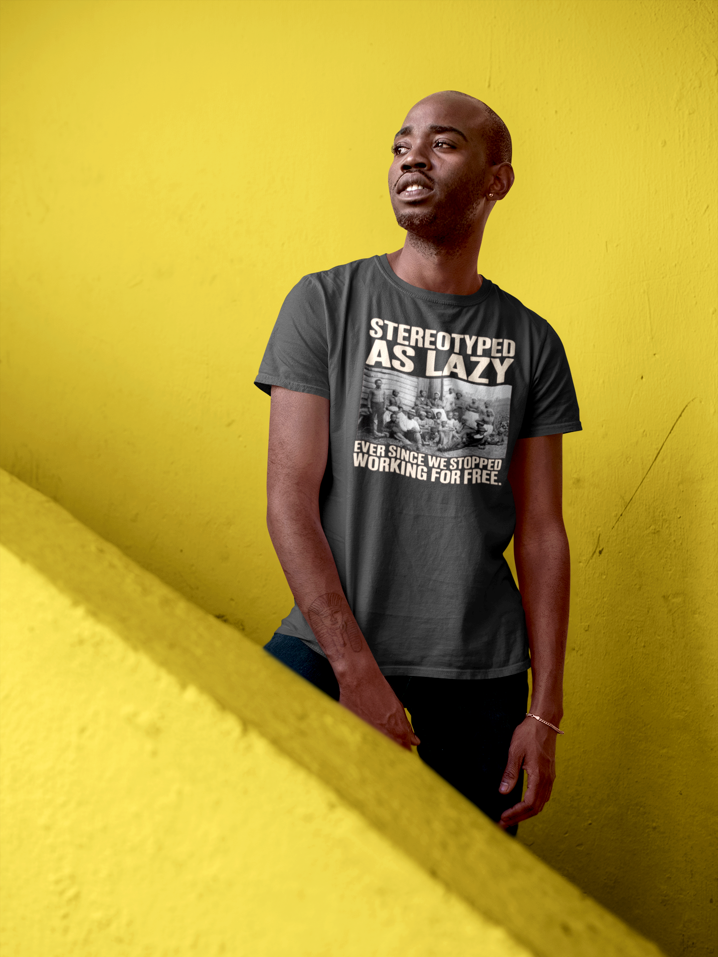 t-shirt-mockup-of-a-man-standing-in-a-colorful-stairway-26318.png