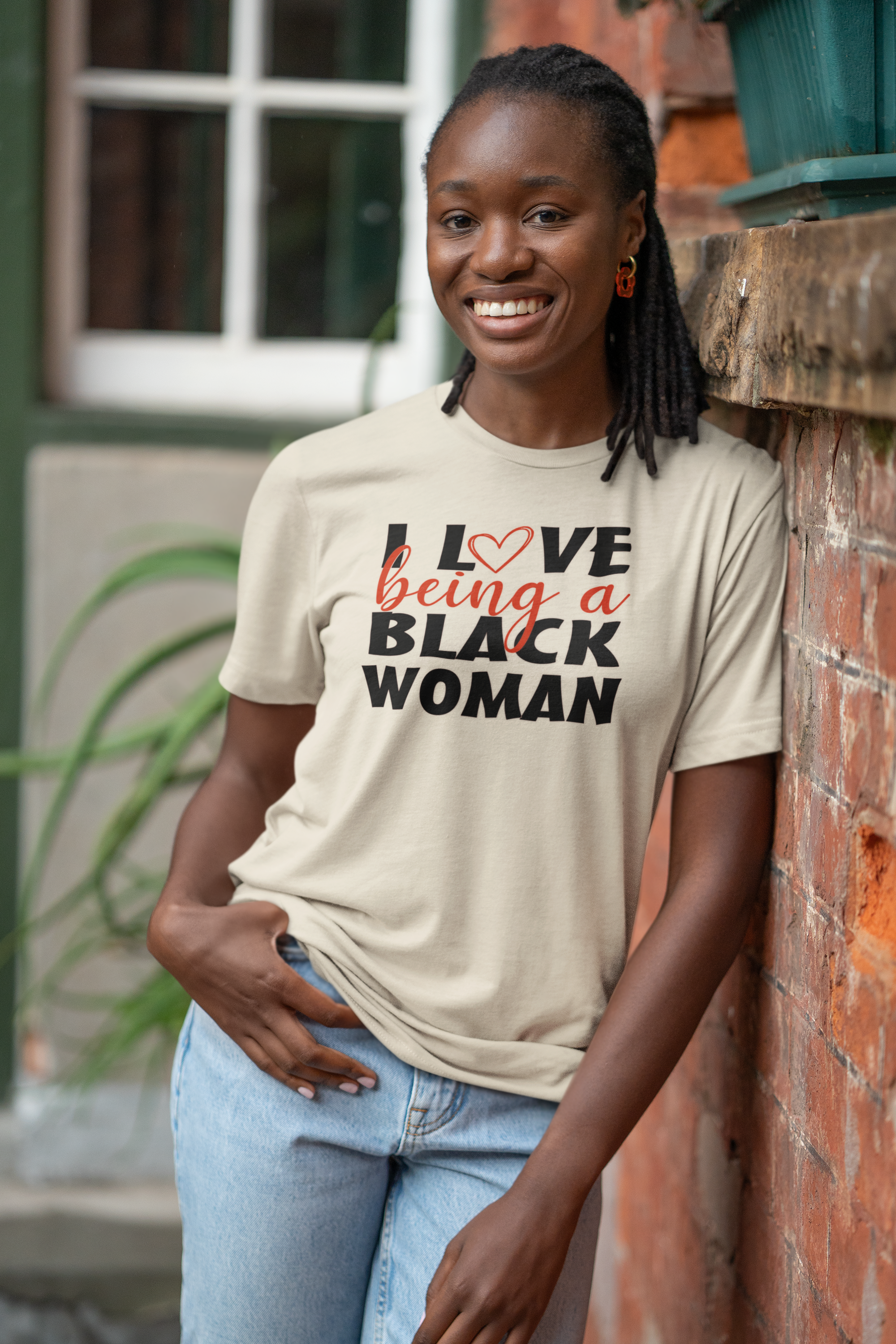 bella-canvas-t-shirt-mockup-featuring-a-smiling-woman-posing-against-a-brick-wall-m39787.png