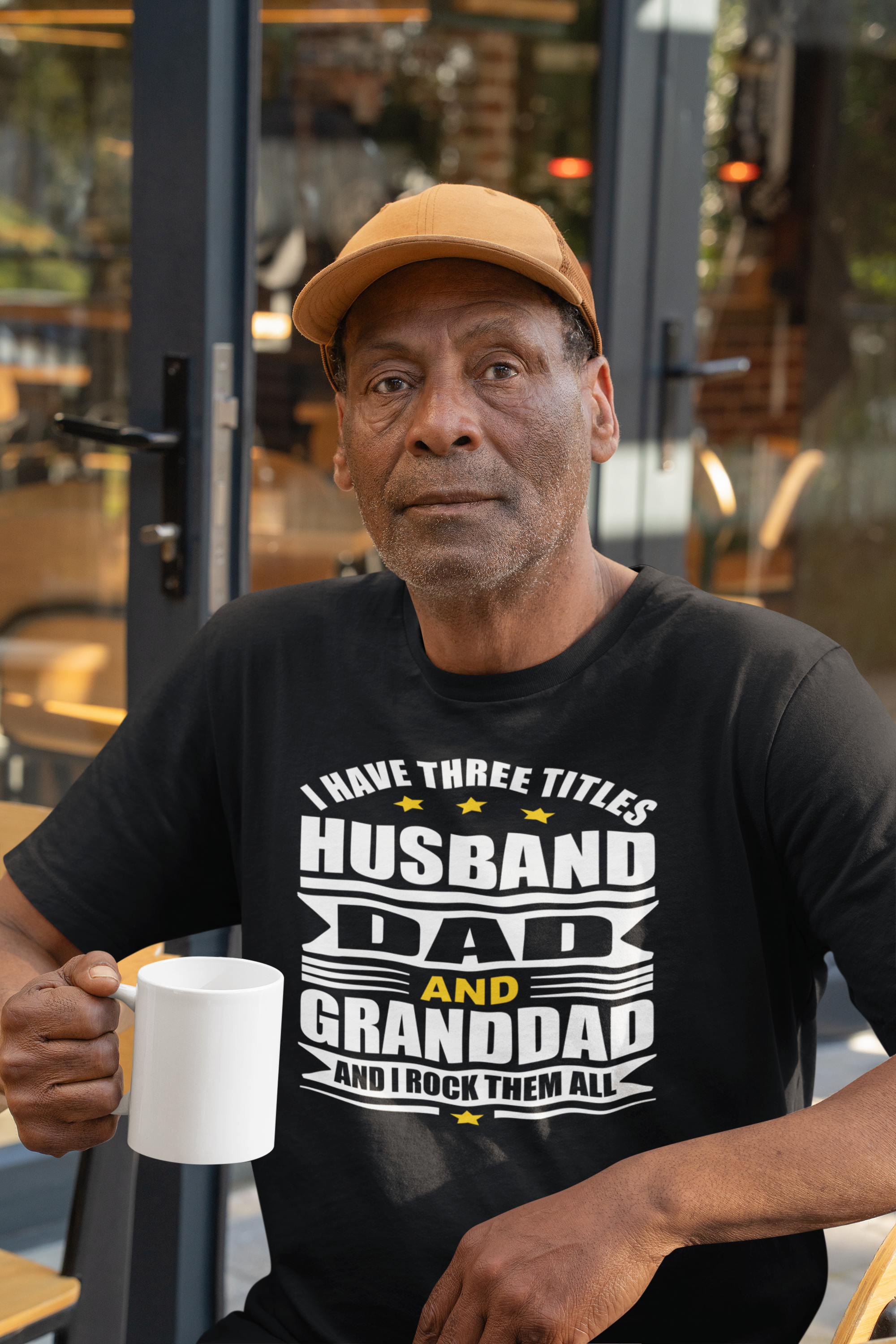 bella-canvas-t-shirt-mockup-featuring-a-senior-man-with-an-11-oz-coffee-mug-m51511.png