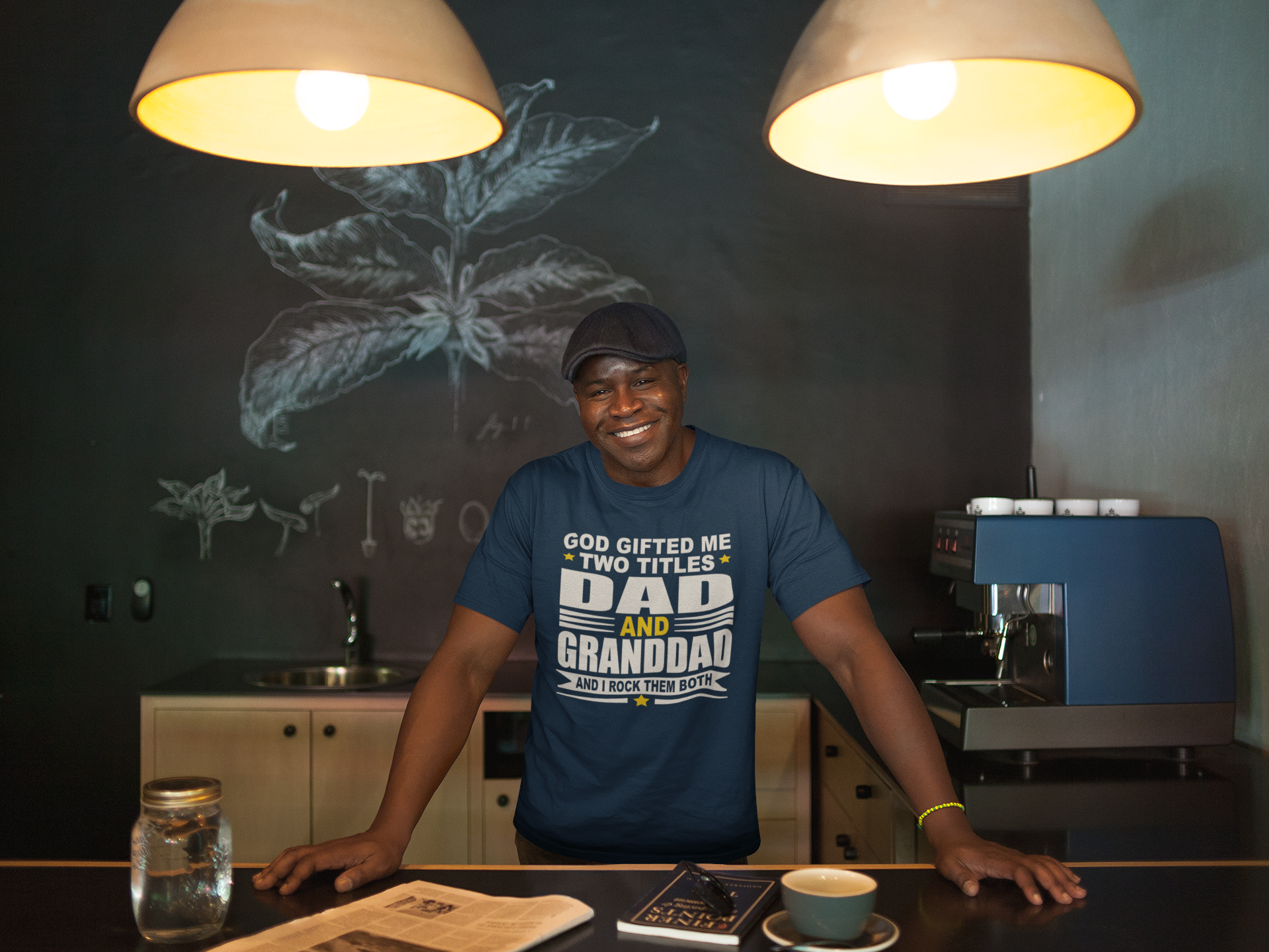 mockup-of-a-smiling-black-man-wearing-a-round-neck-t-shirt-and-a-beret-at-home-a21422.png