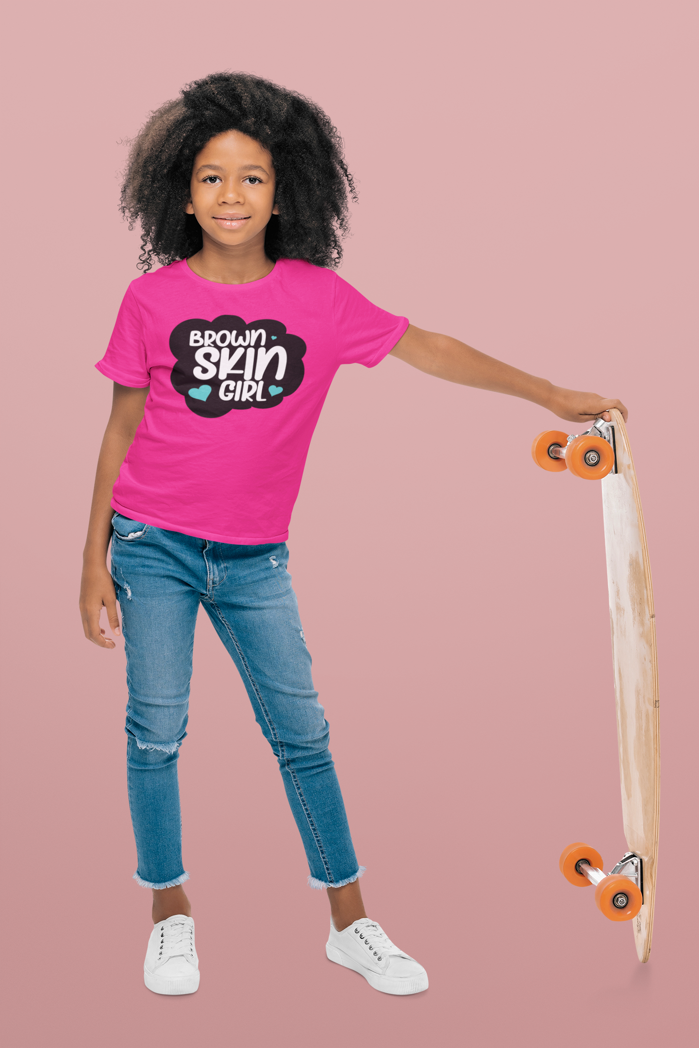 t-shirt-mockup-of-a-little-skater-girl-in-a-studio-44544-r-el2.png