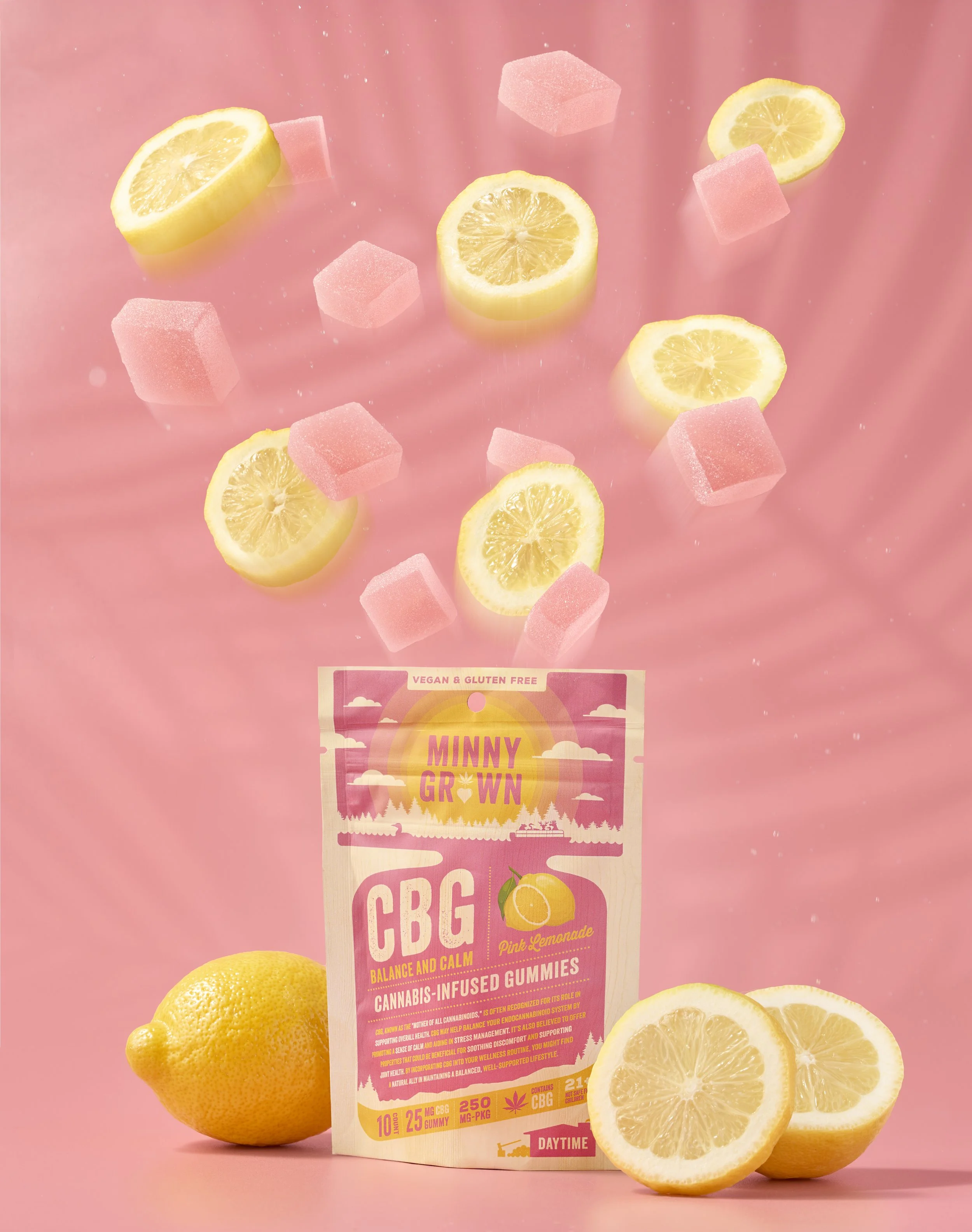 Pink background with lemon slices, pink gummy cubes, and a package labeled "Minn Grown" cannabis-infused gummies.