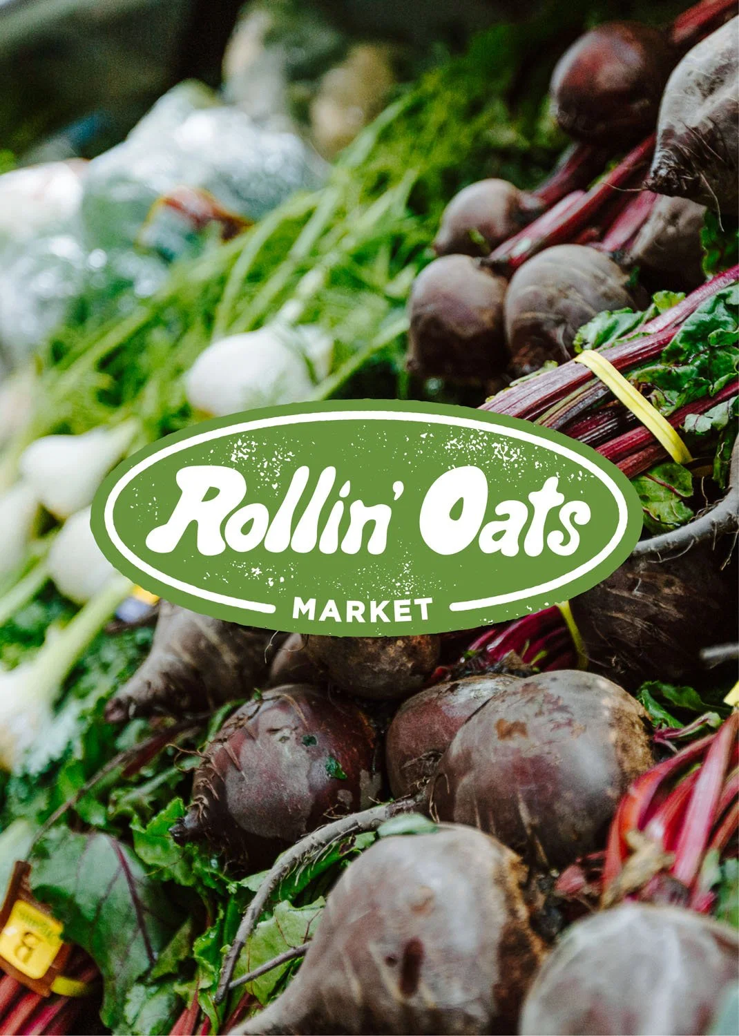 Rollin' Oats Market Primary Logo over Vegetables