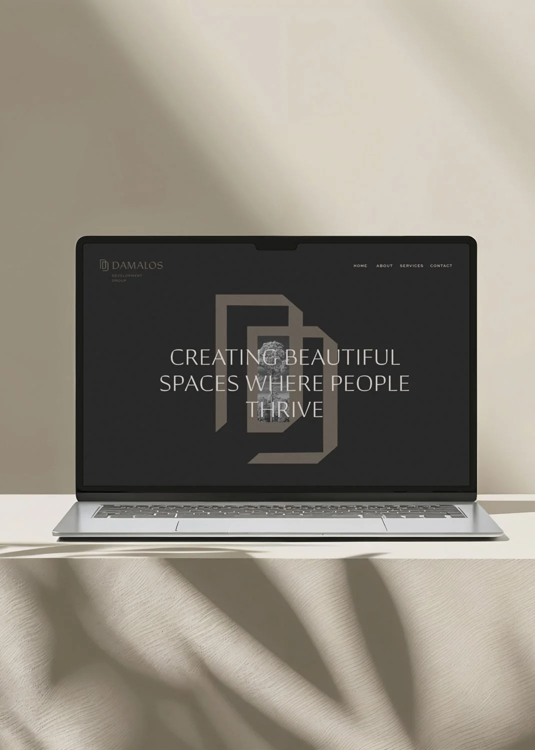 Damalos Development Splash Page Mockup