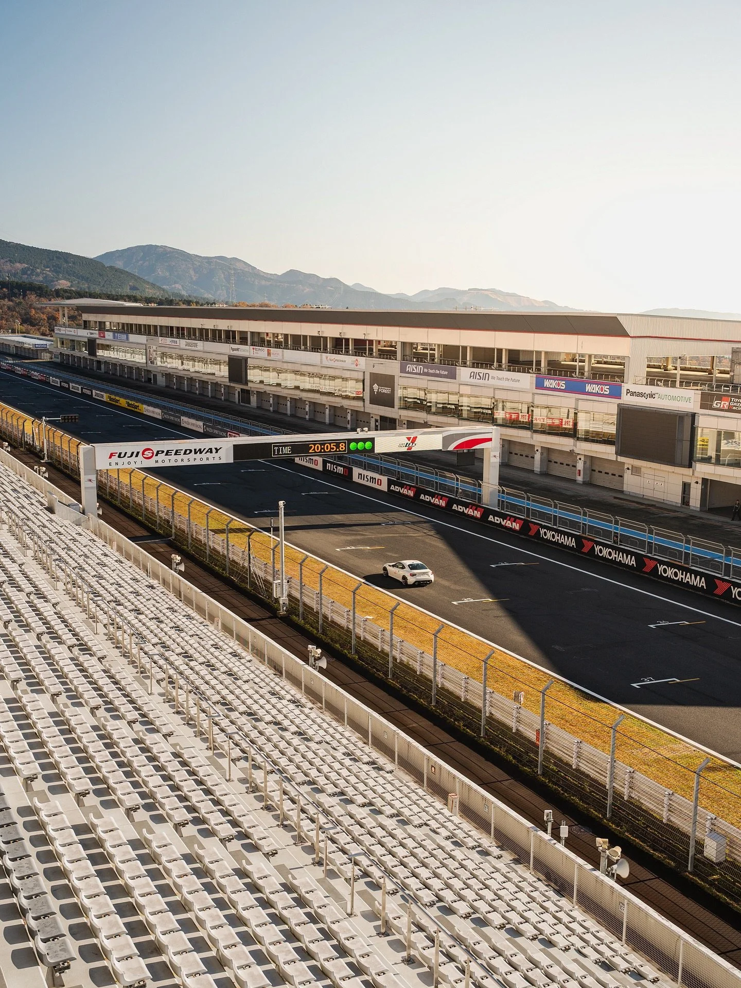 While waiting for my turn at Fuji Speedway&rsquo;s experience day, I snapped a few shots of the other racers tearing up the track. Such an awesome scene! #fujispeedway #jdm #racetrack
