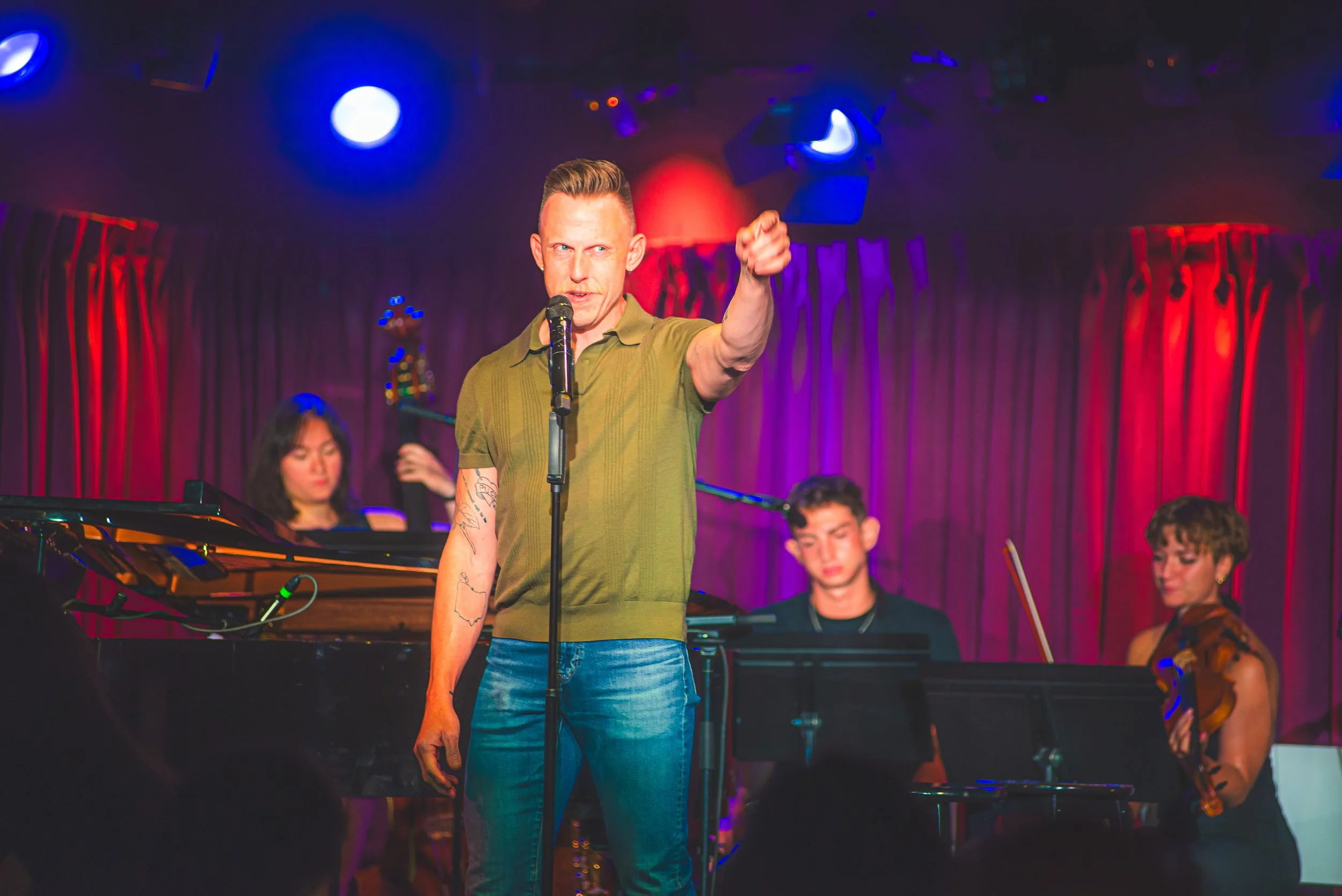 David singing at Greenroom 42 in NYC with a band