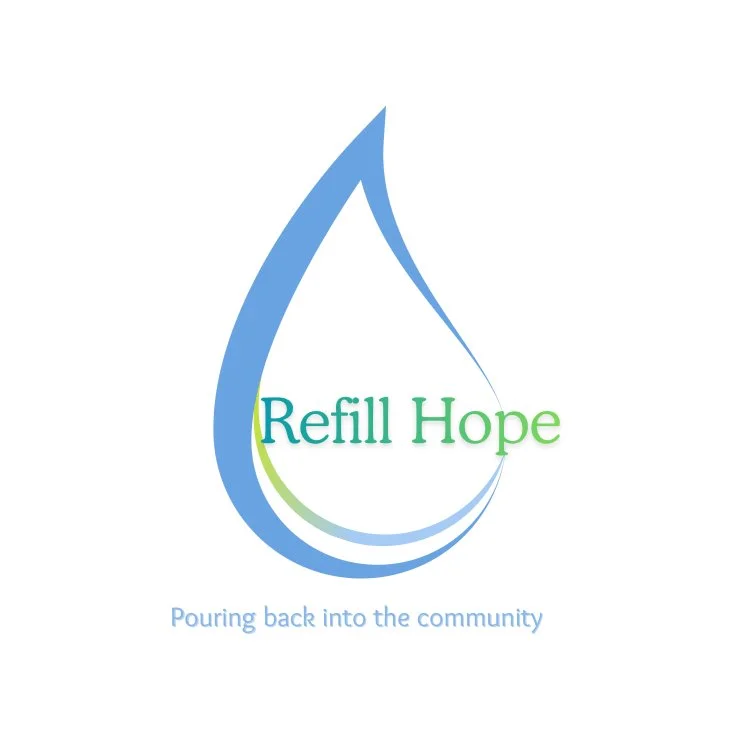 A logo with a large water droplet outline in blue, containing the text 'Refill Hope' with green and blue colors, and a tagline below that says 'Pouring back into the community'.