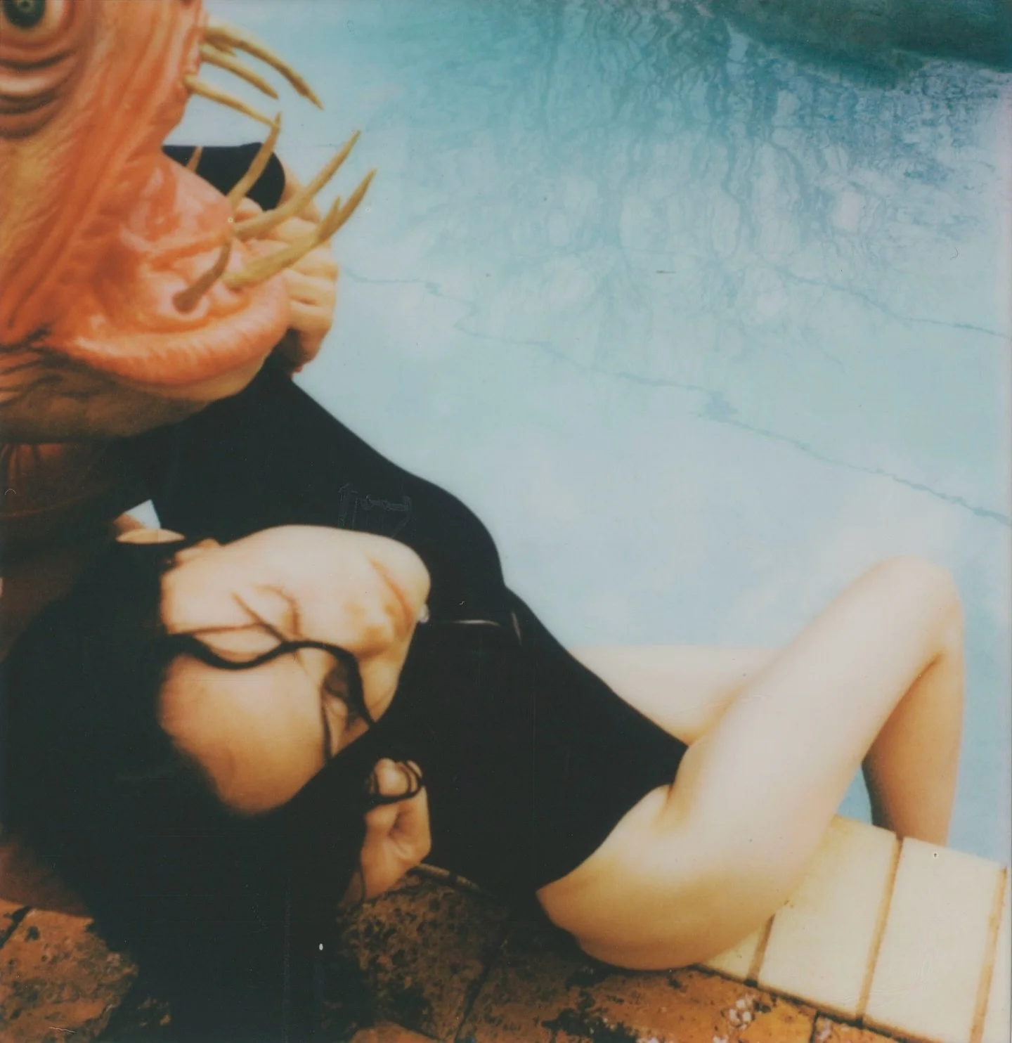 BREATHLESS

Special FX @corbin.creatures
@Polaroid I-2 on color 600 film
Wardrobe @versace 1980s one piece Longsleeve bathing suit 
#polaroid #instantfilm #expiredfilm #experimentalphotography #filmisnotdead