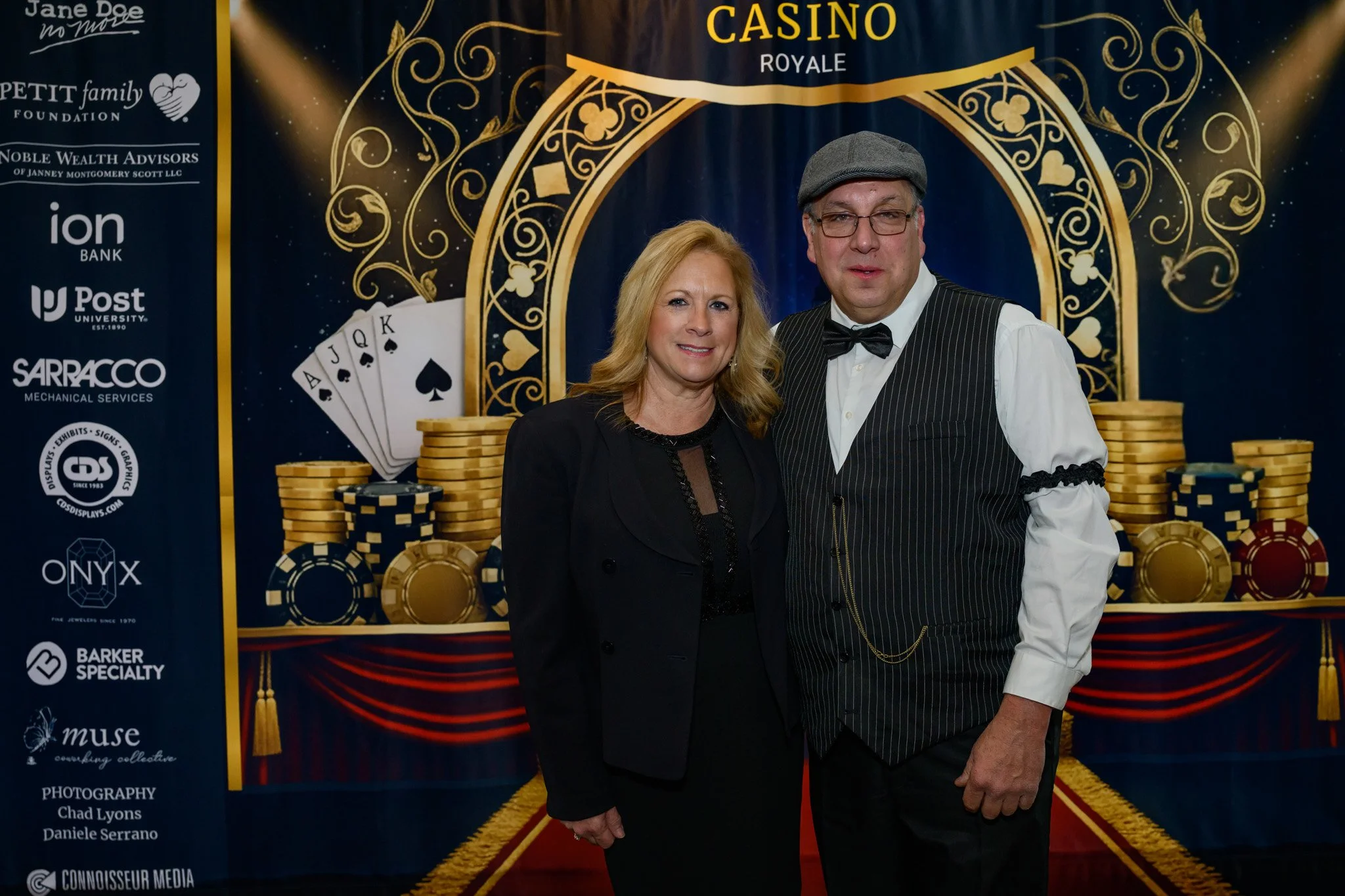 2026 Gala couple man with cap and arm band.jpg