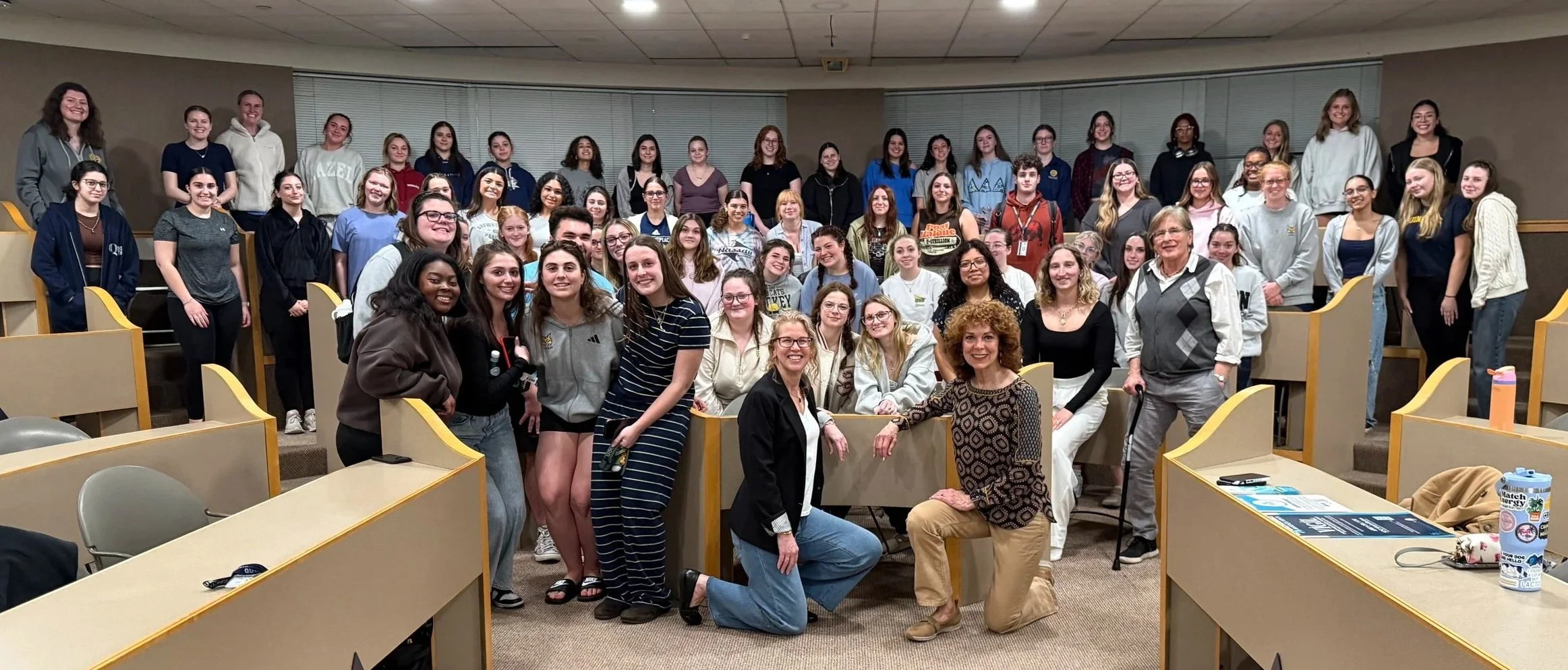 students and presenters in auditorium