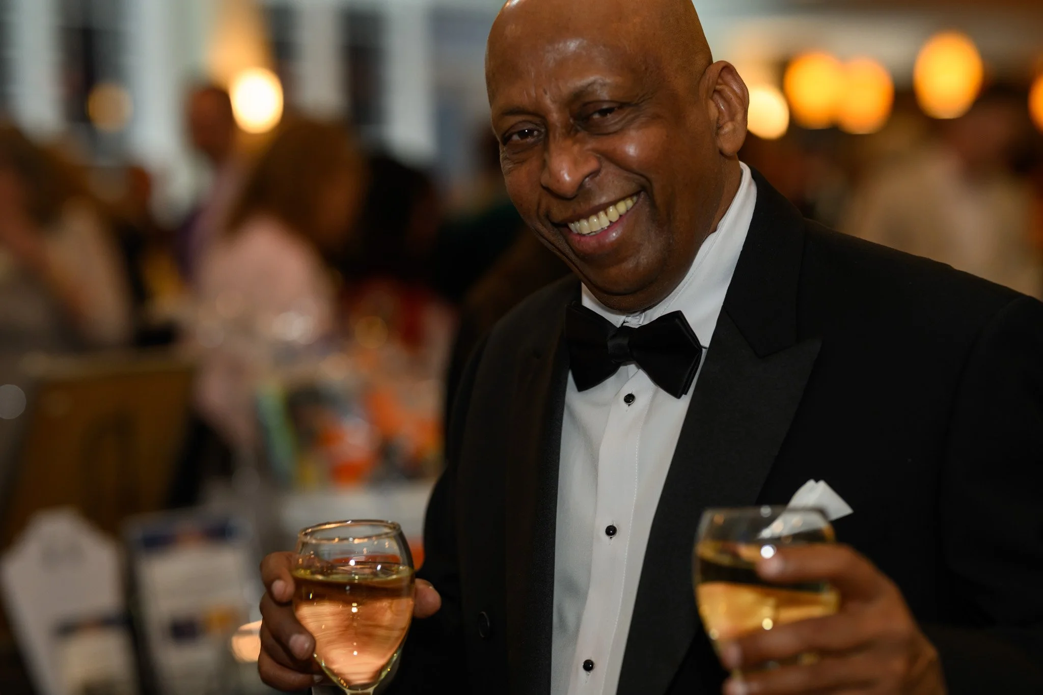 2026 Gala man in tux smiling.jpg