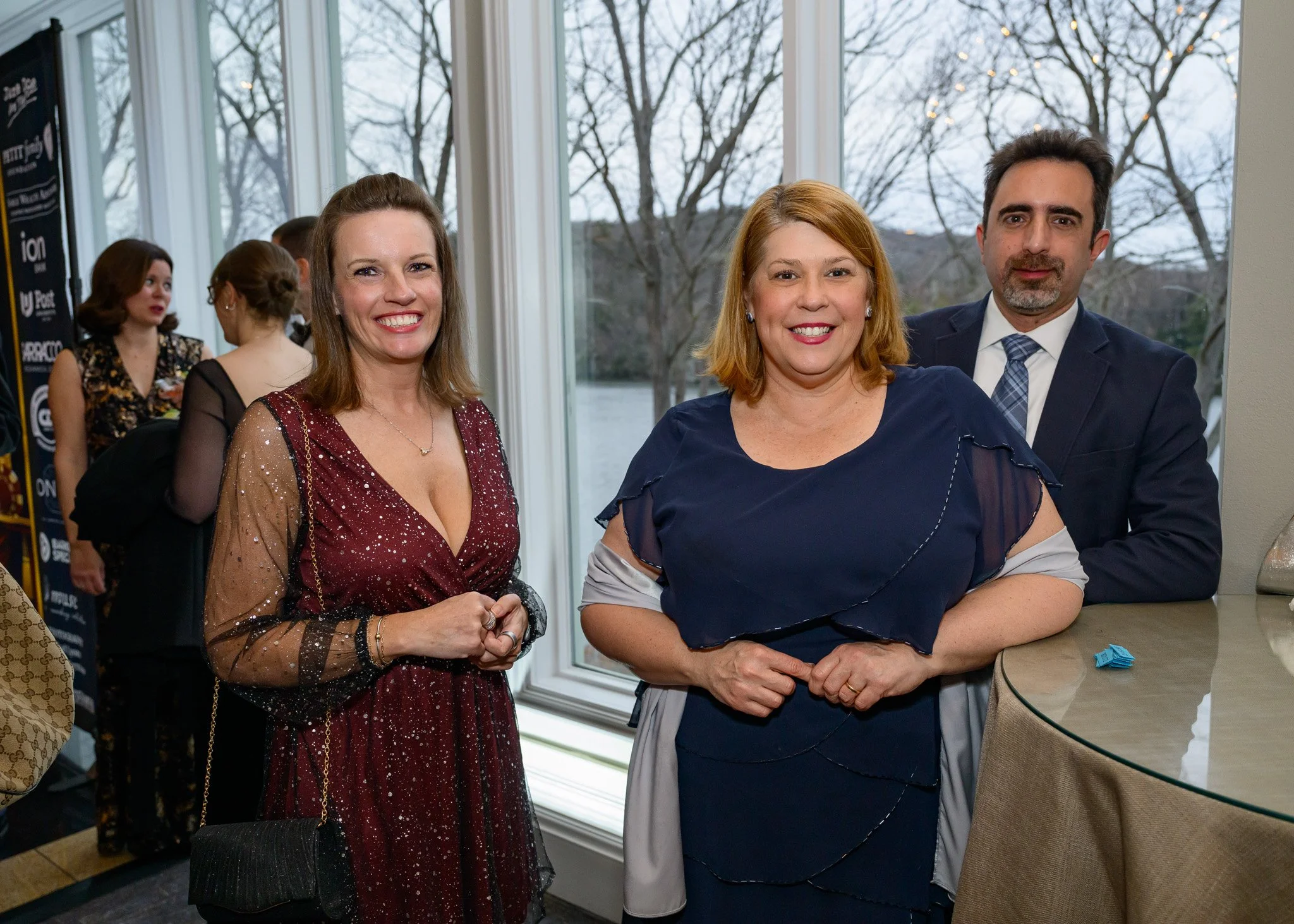 2026 Gala 3 people at cocktail hour.jpg