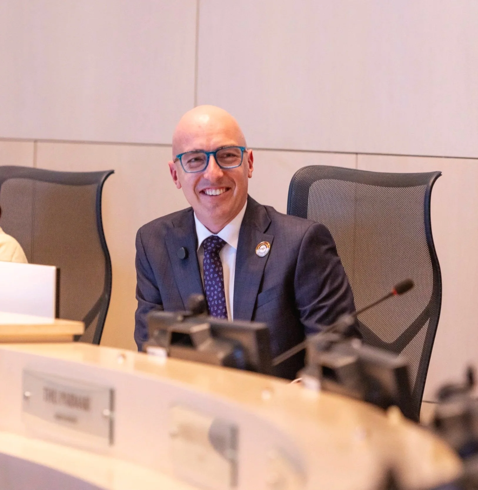 Edmonton's Mayor Andrew Knack smiling from  the Mayor's chair in City Council Chambers.
