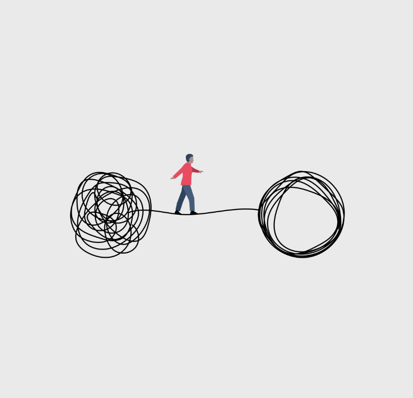A person walking on a line connecting two large, tangled circles, indicating a metaphor for balancing chaos and order.