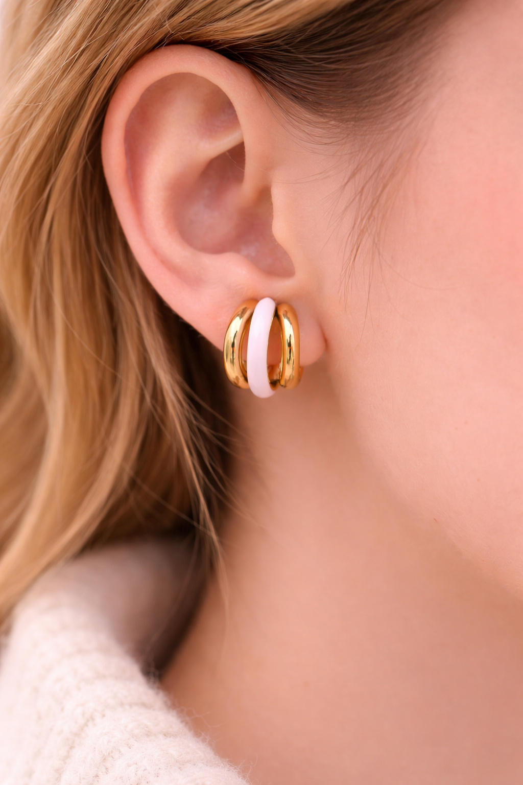 Gold and pink enamel huggie earrings.png