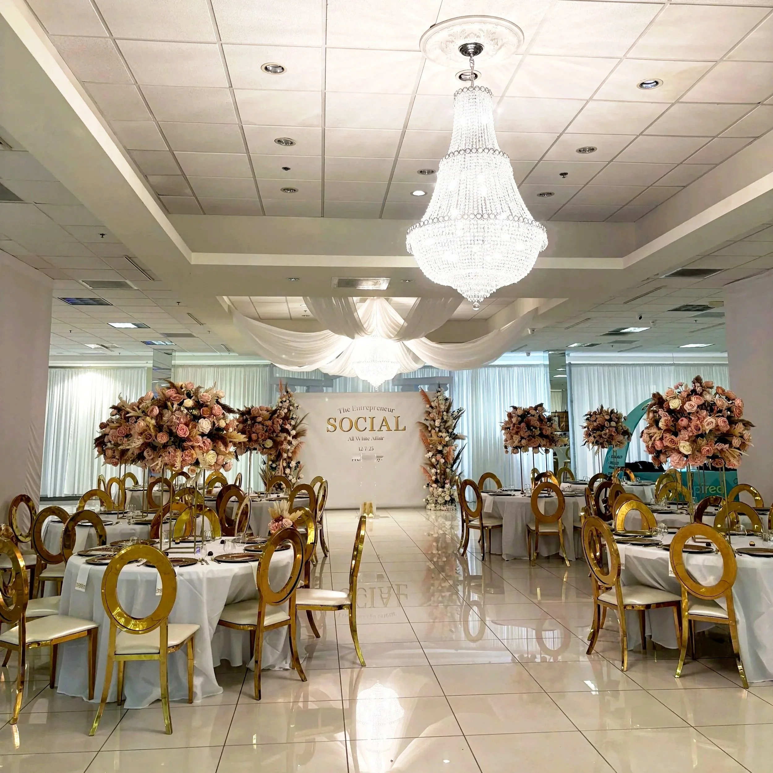 Laurie’s customers, Larissa and Emmett, just married walking off the aisle together.