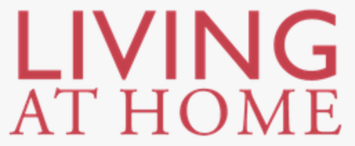 Text: "Living at Home" in roten Großbuchstaben auf weißem Hintergrund.