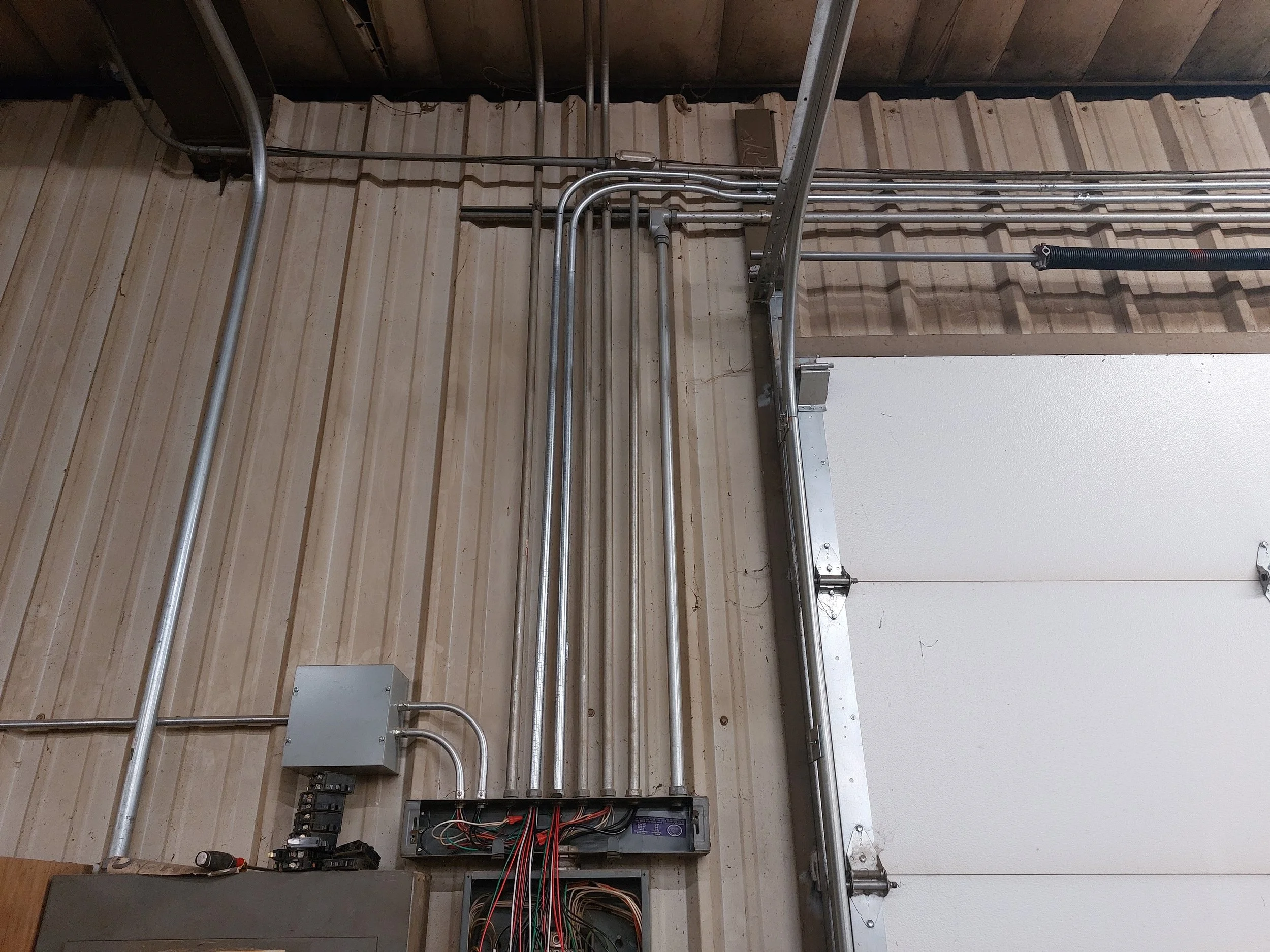 Electrical wiring and conduit system with smooth bends matching existing work.