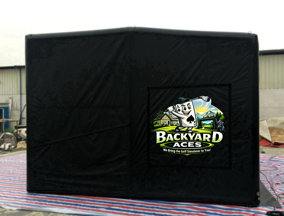 Large black enclosure with a Backyard Aces logo featuring a cartoon card character on a golf course, with the slogan "We Bring the Golf Simulator to You!"