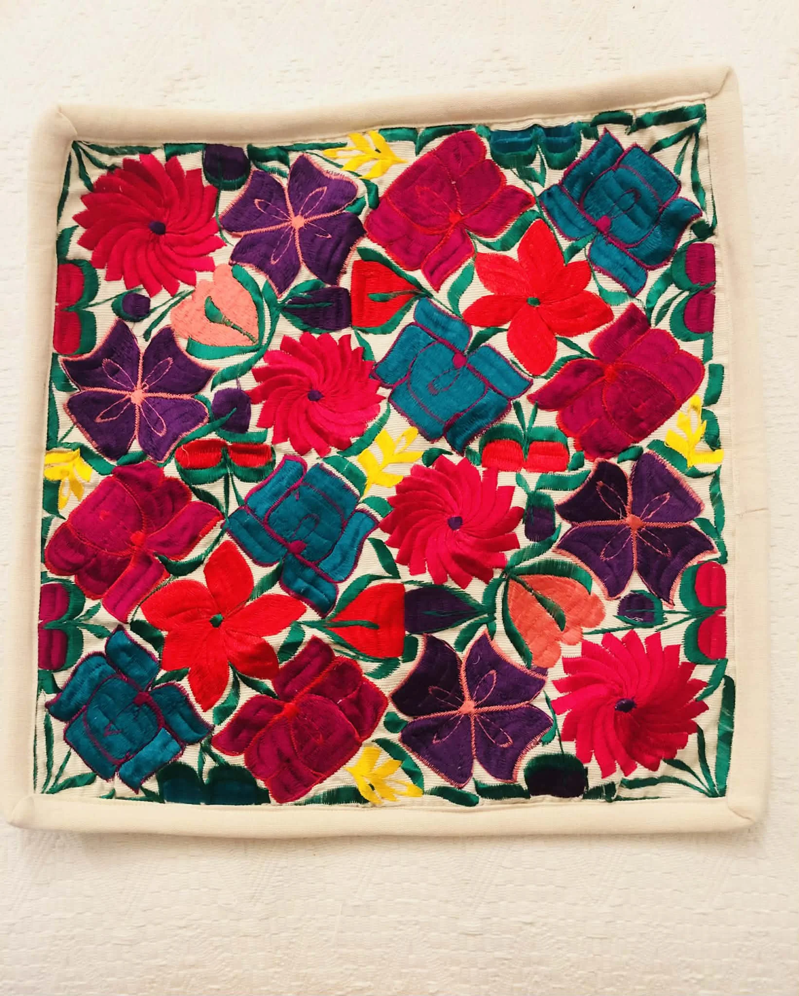 White Hand Embroidered cushion cover with flower design