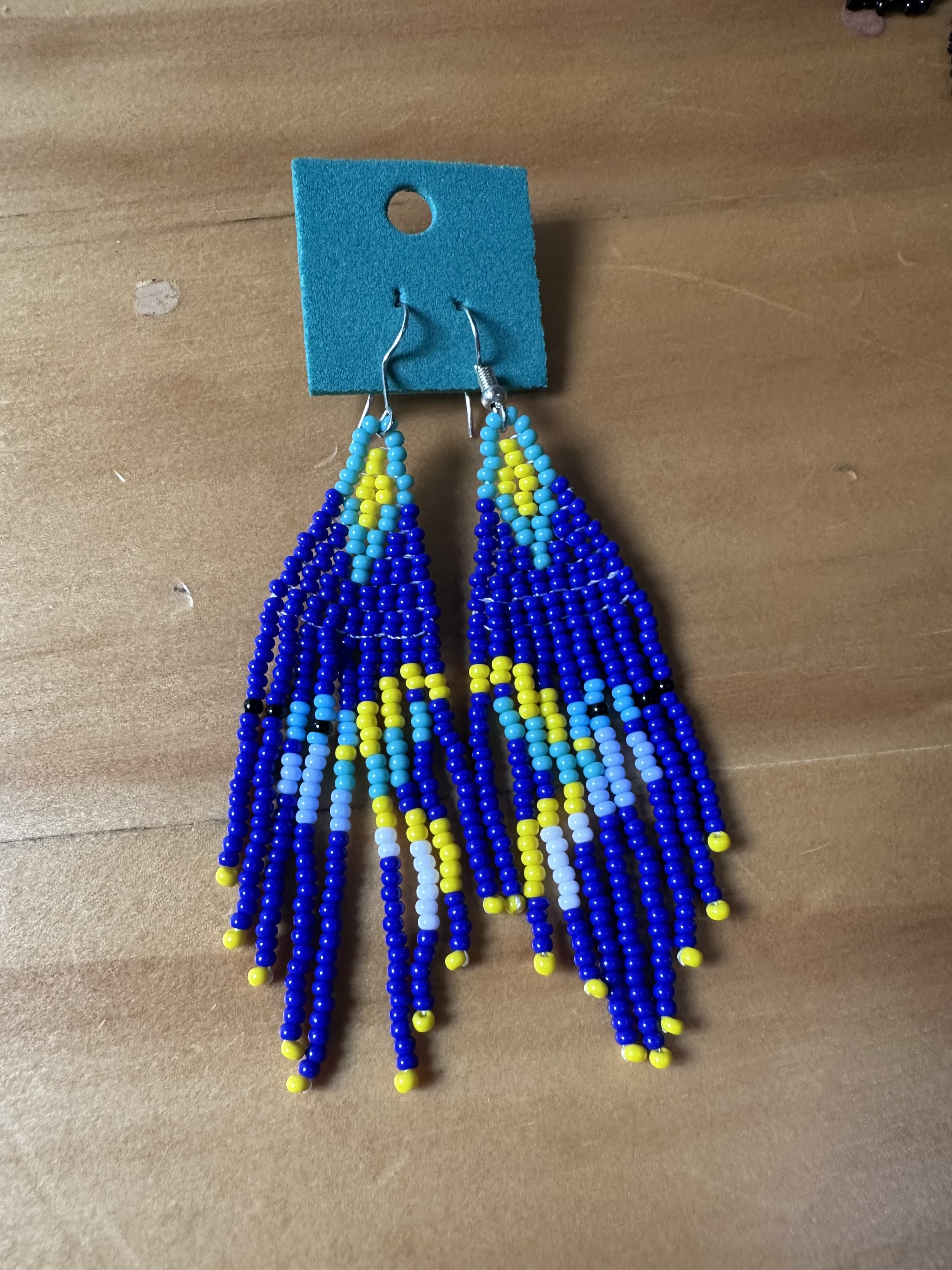 Dark blue hand beaded bird earrings