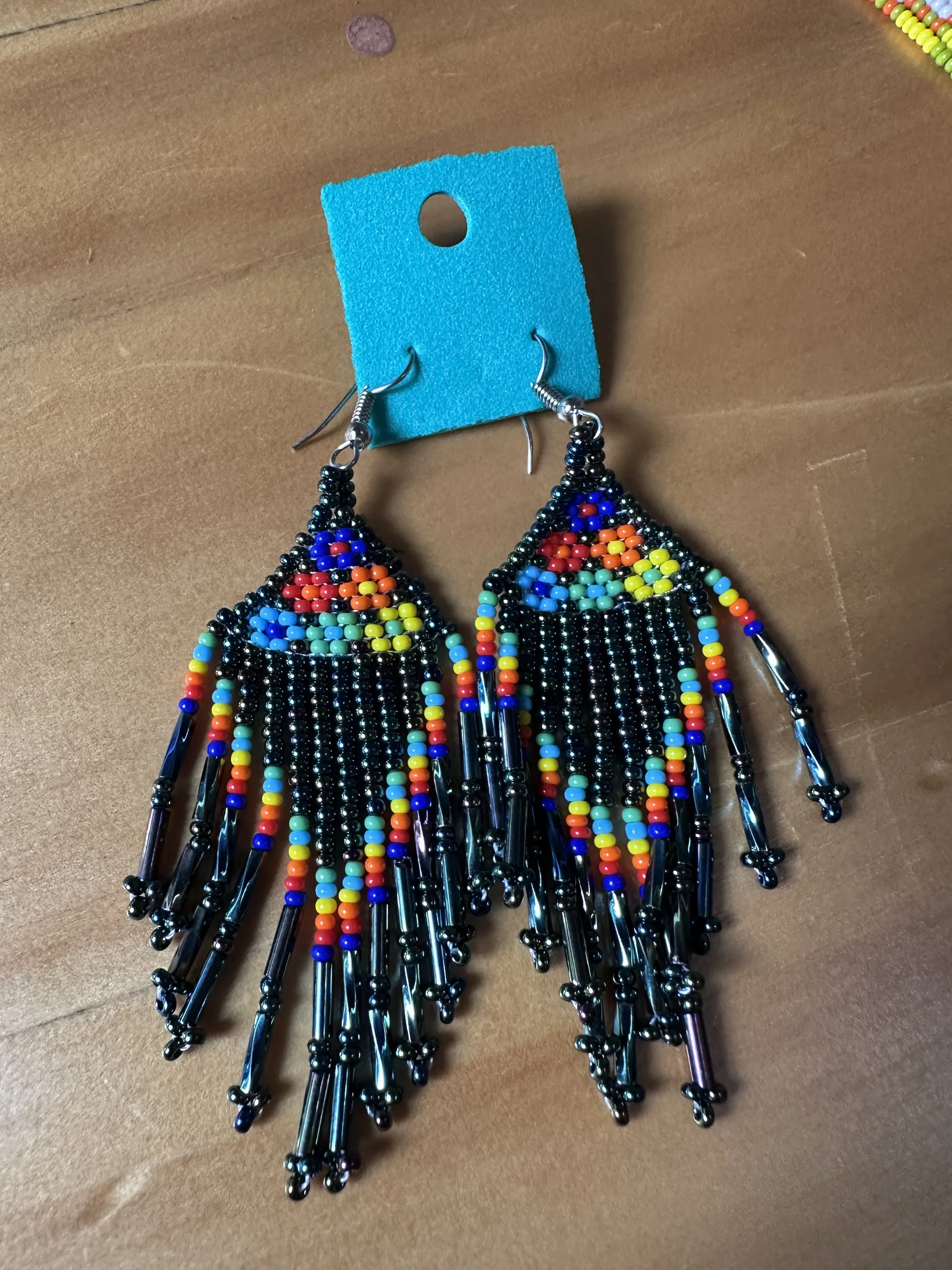 Emerald black flower handed beaded earrings