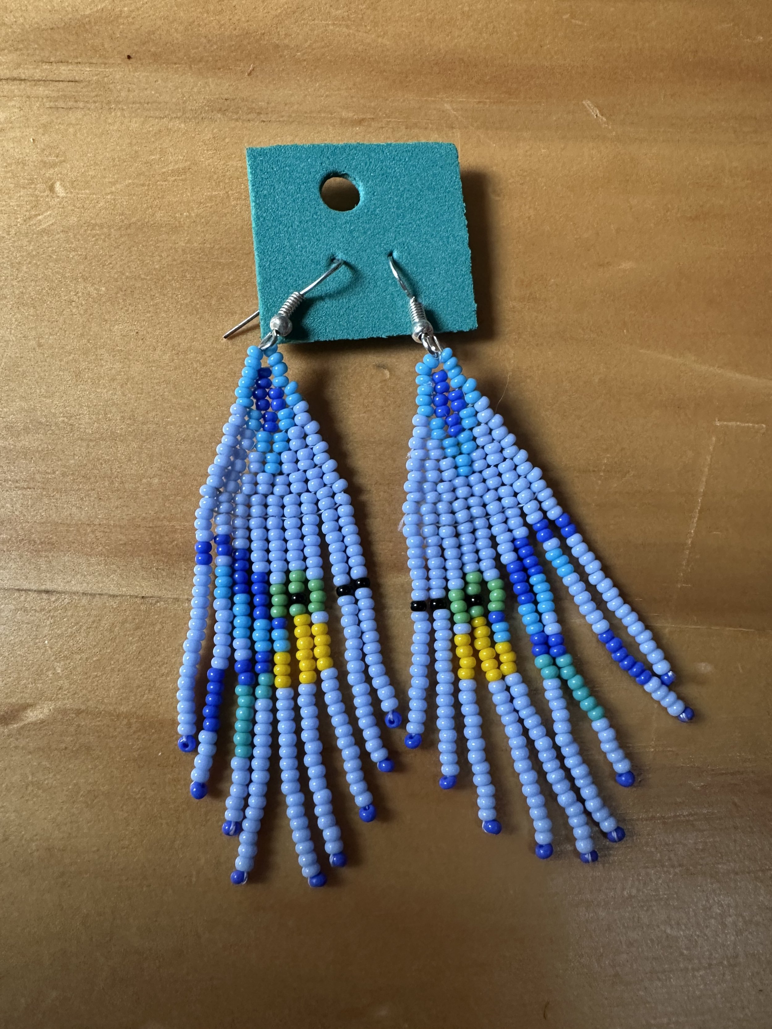 Light blue hand beaded bird earrings