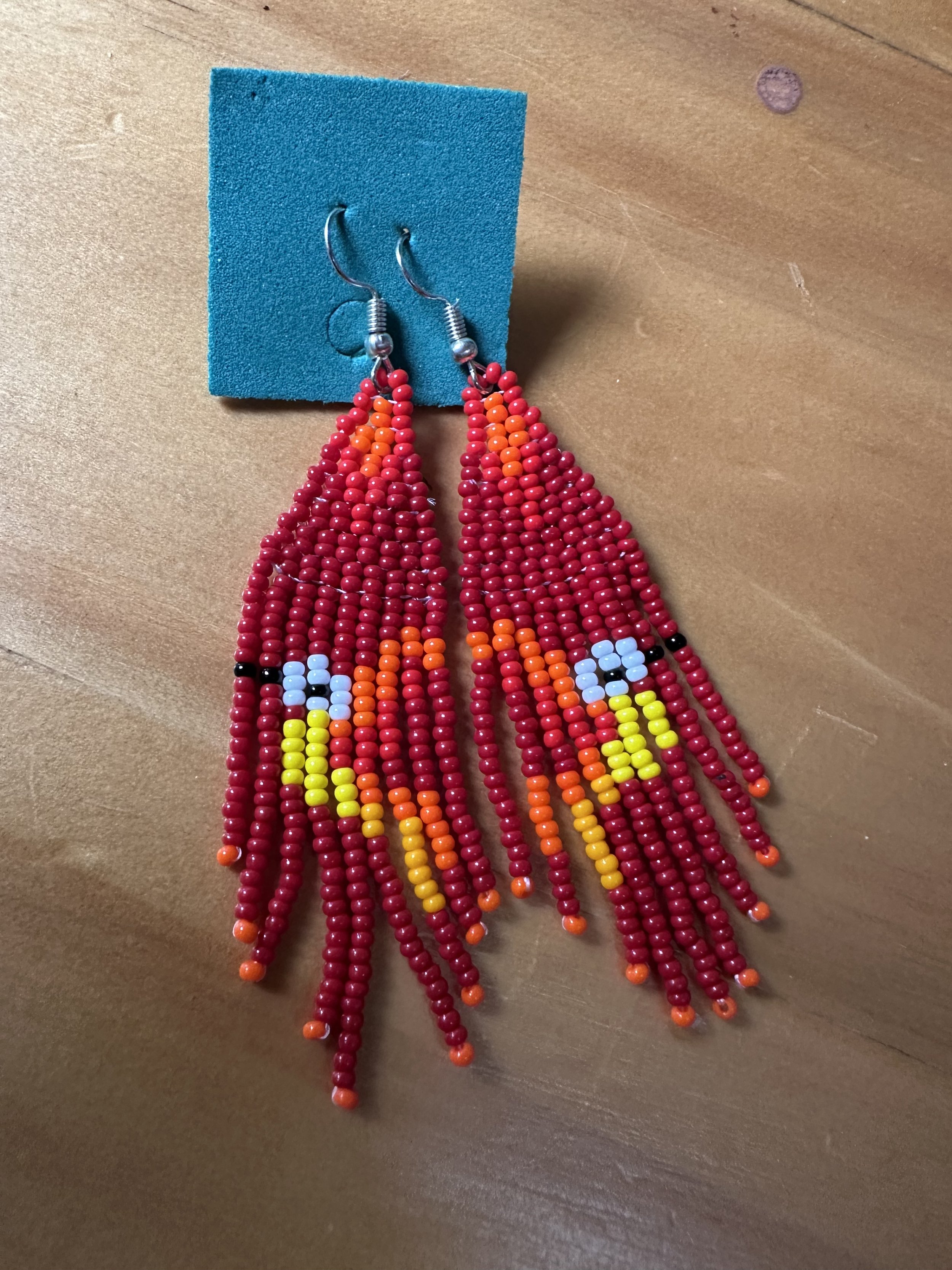 Red hand beaded bird earrings