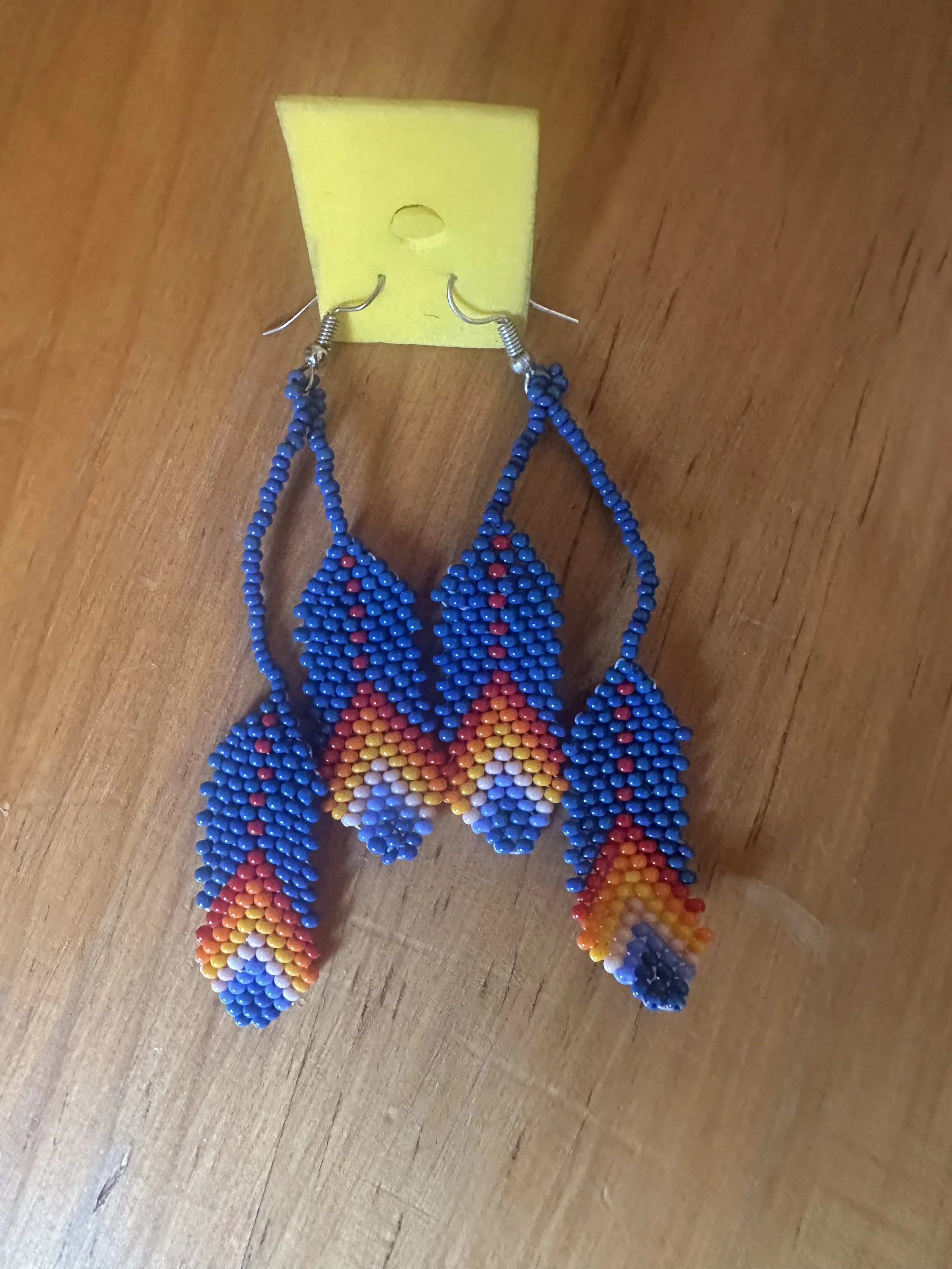 Blue feather hand beaded earrings