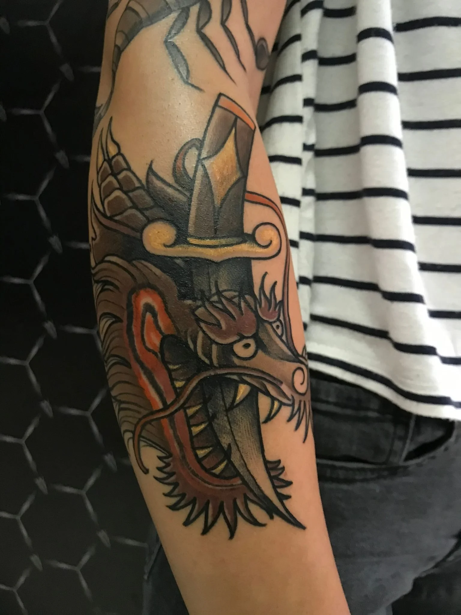 Traditional Dragon With Sword Arm Color Tattoo Berlin Done By LonoTattoo