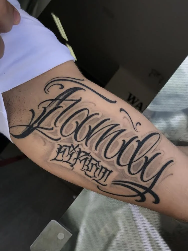 Lettering Black and Grey Family First Healed Arm Tattoo Done By LonoTattoo