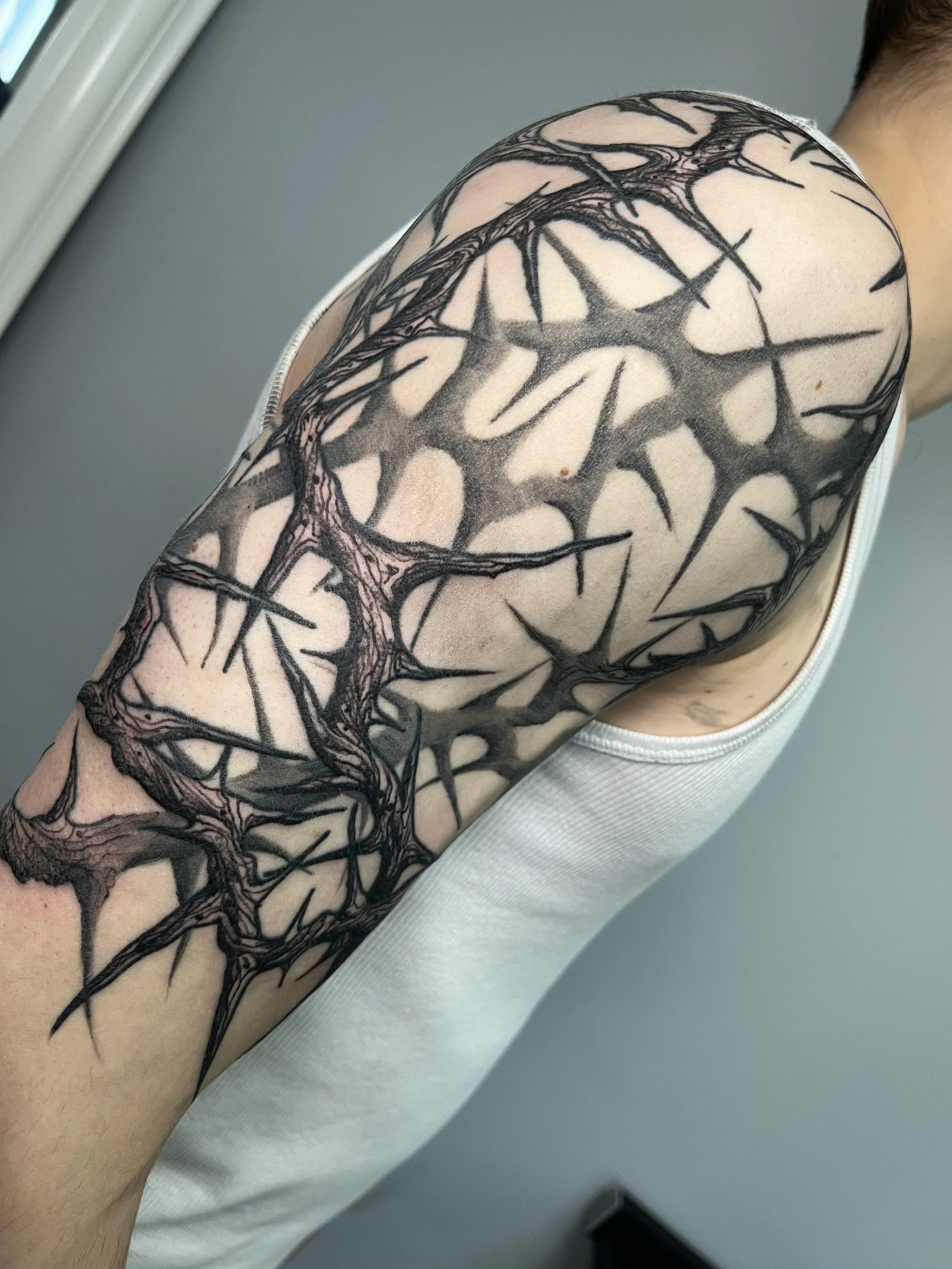 Traditional Thorns Black and Grey Half Arm Sleeve Tattoo Done By LonoTattoo