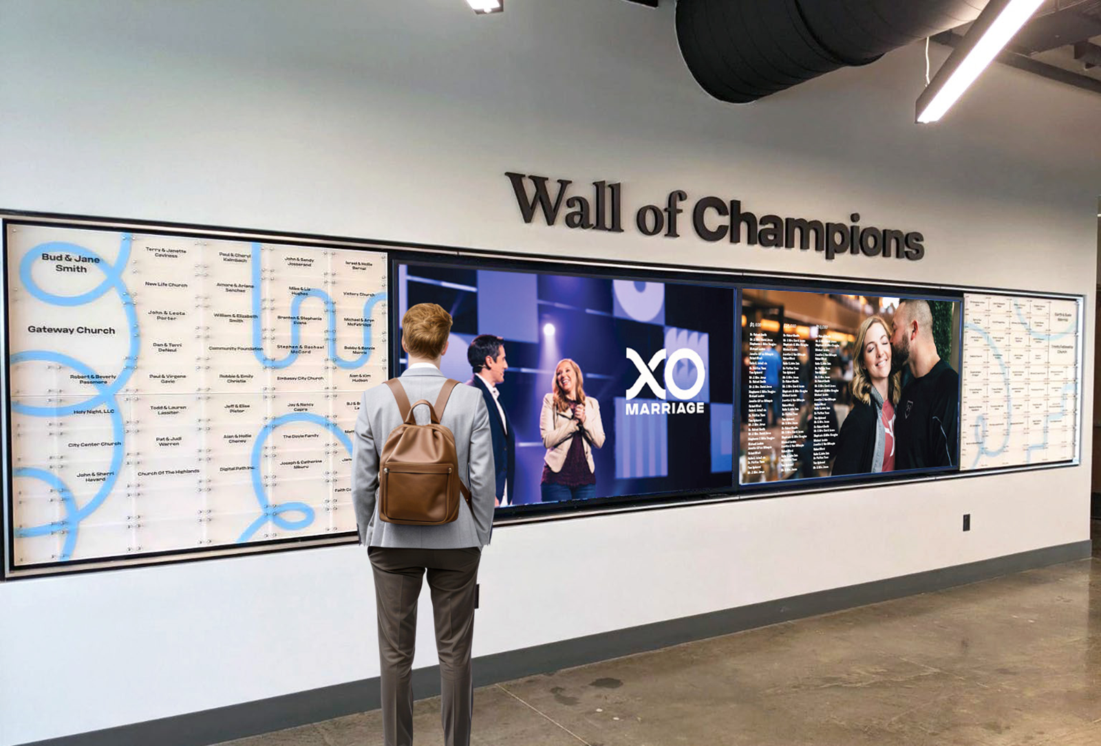 Person standing in front of a Wall of Champions display at a church or conference venue.